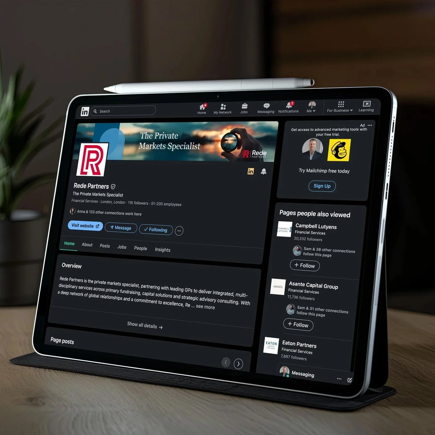 A tablet displaying the LinkedIn profile page of Rede Partners, a private markets specialist financial services company based in London