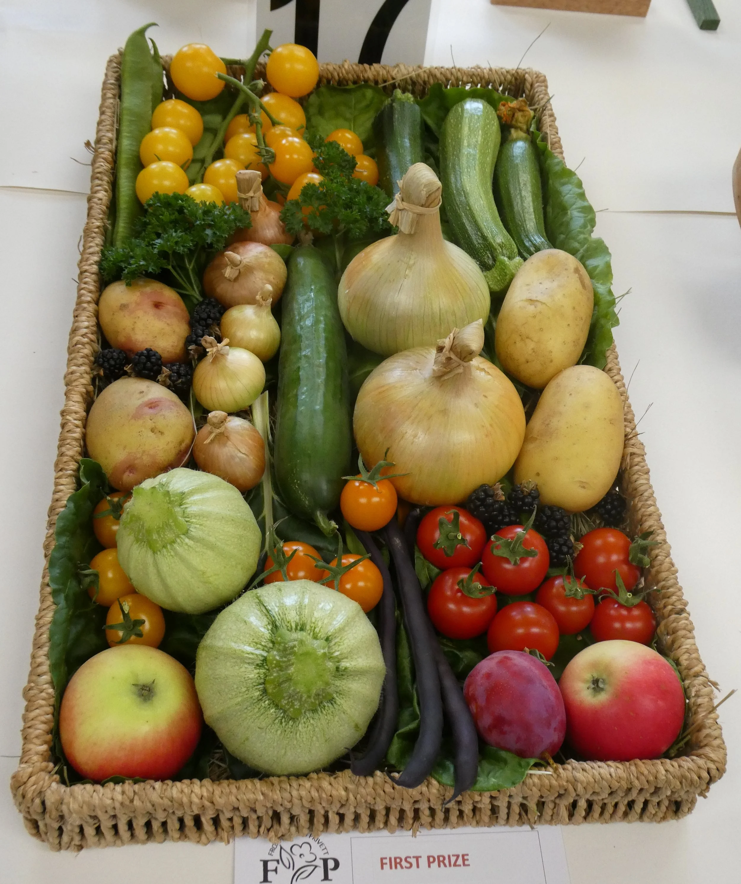 A basket of vegetables and fruit