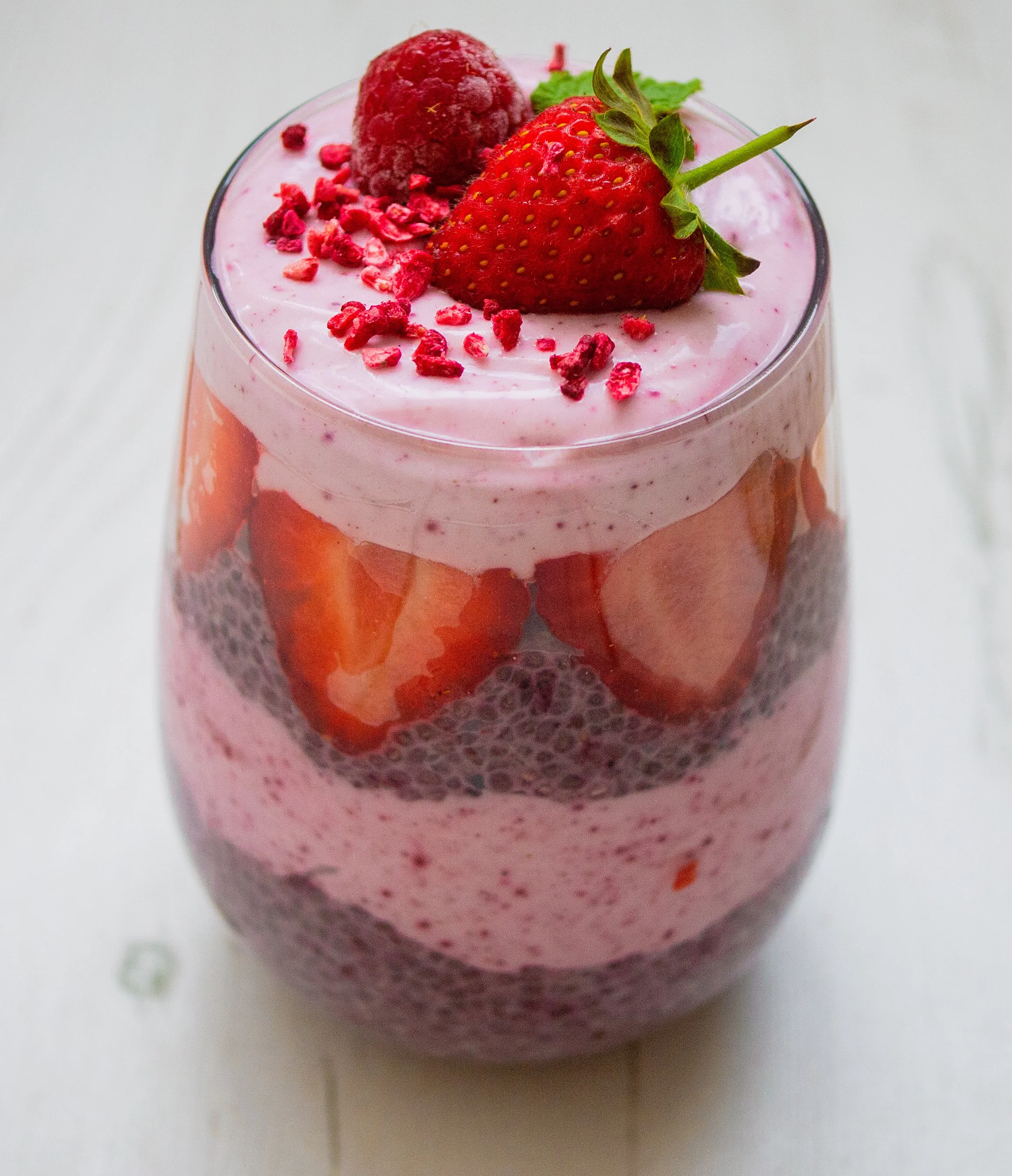 Delicious & nourishing berry chia seed pudding layered with berry
