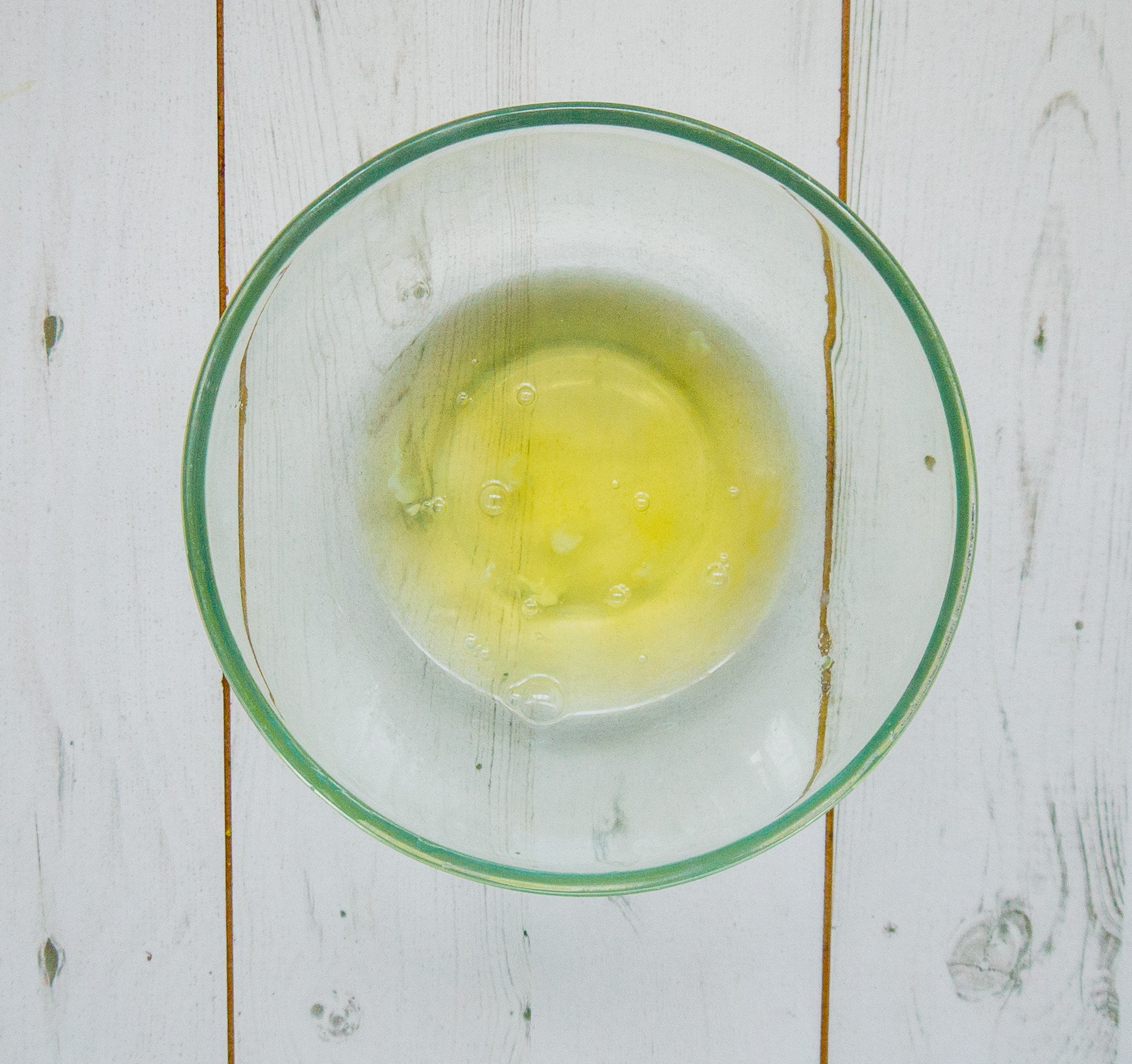 A picture of egg whites in a clear bowl