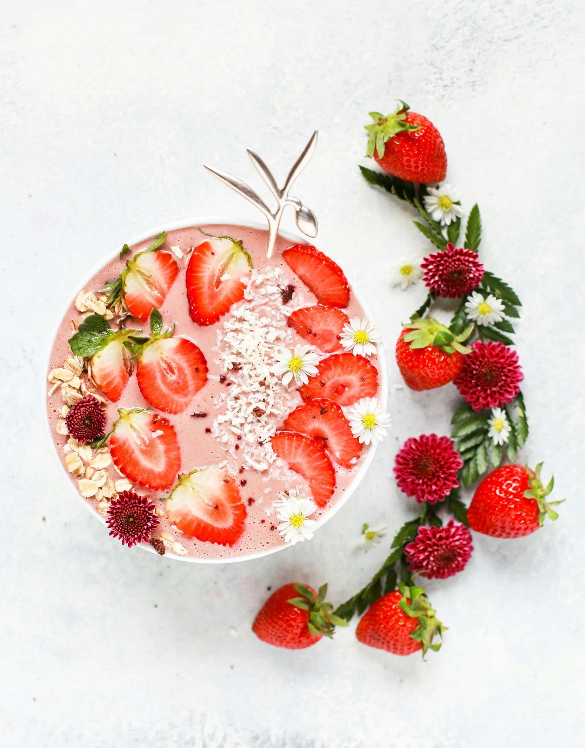 a picture of strawberry smoothie bowl