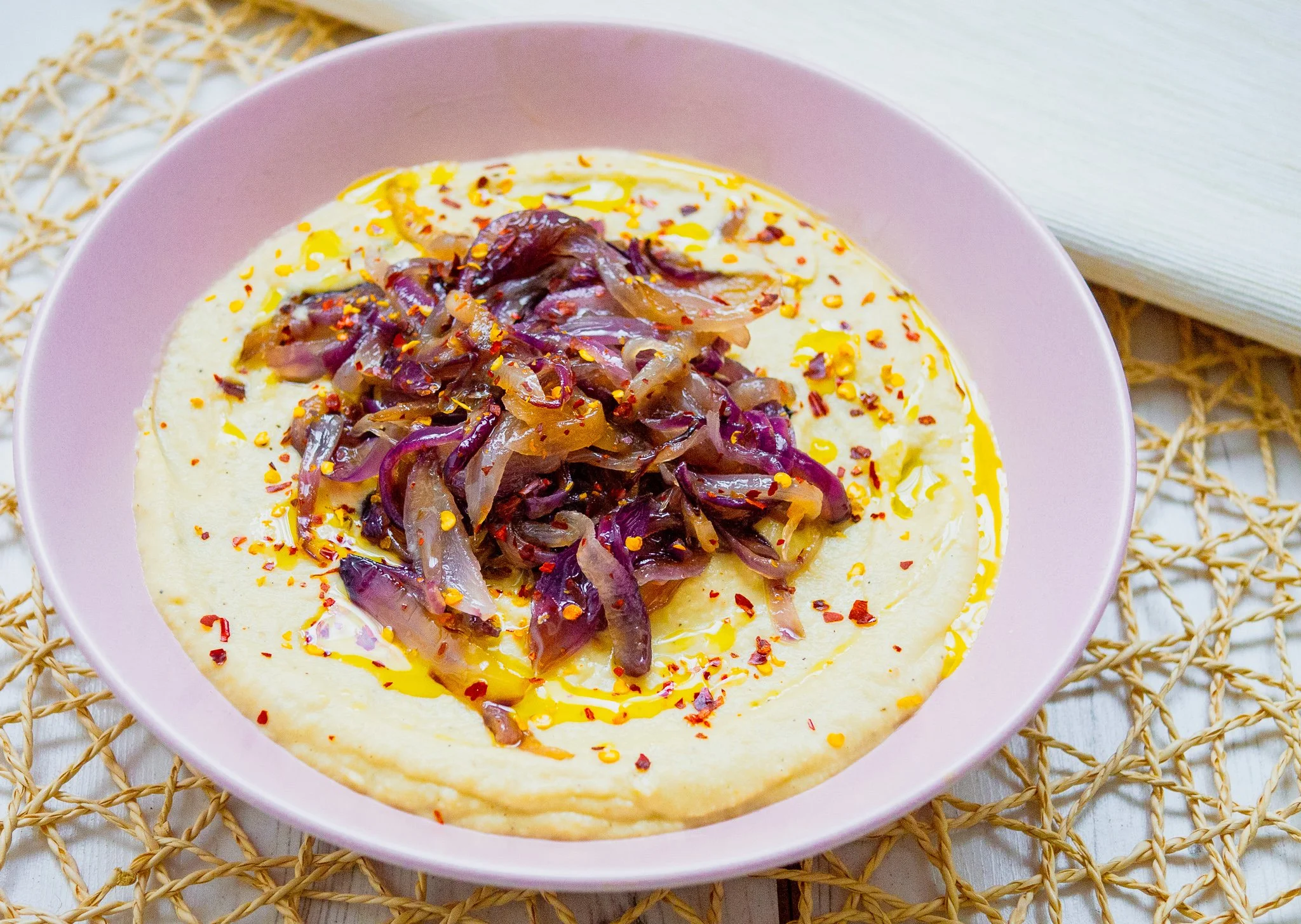 Creamy and smoky white bean dip with smoked garlic, red onions, lemon, olive oil, chilli flakes