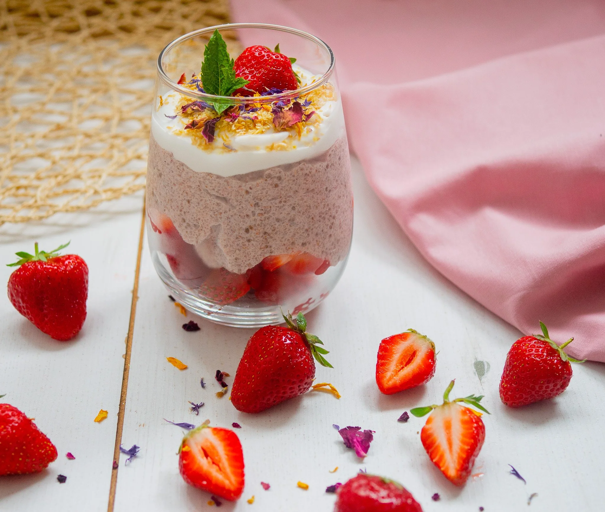 a picture of strawberry chia pudding in a glass
