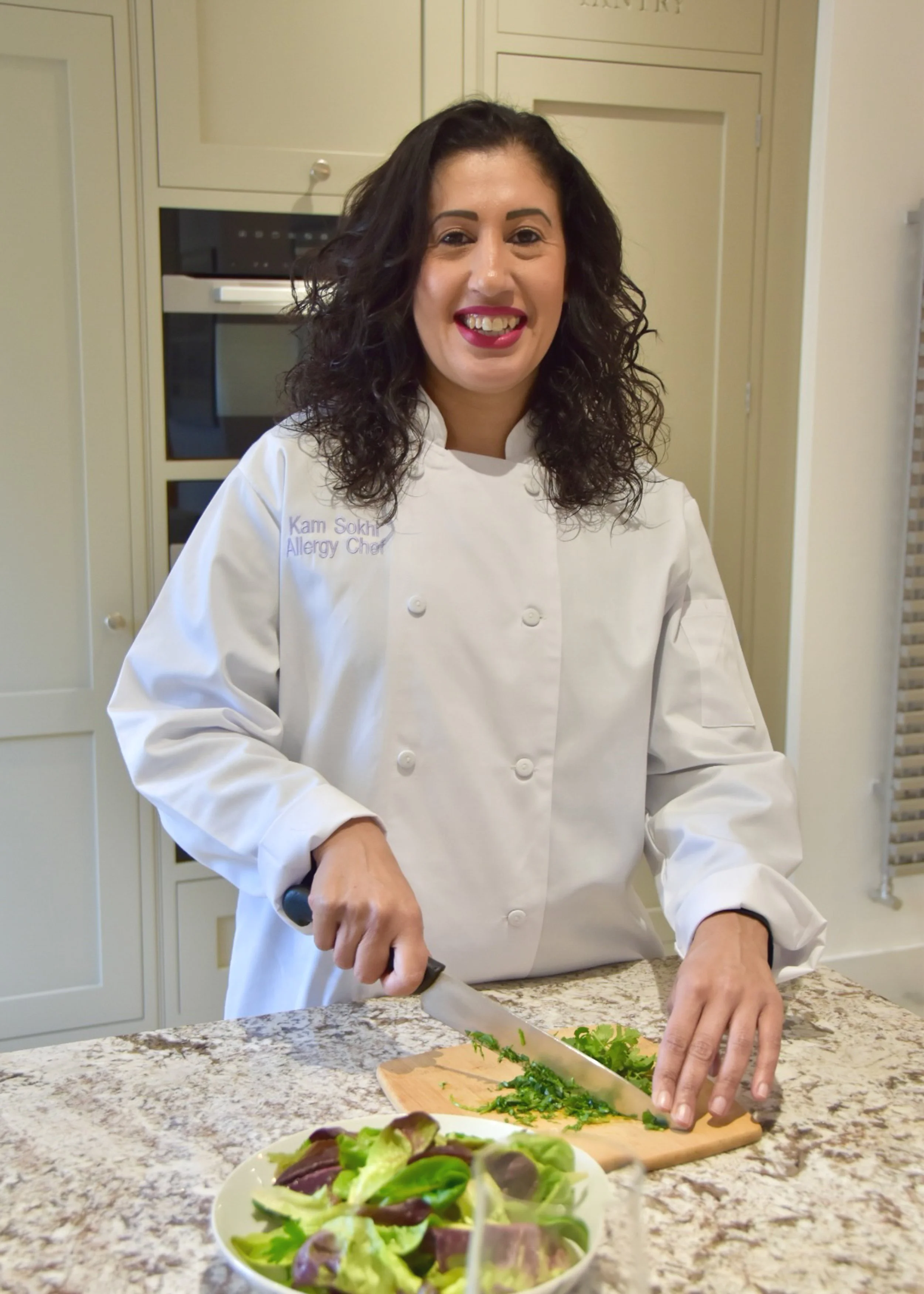 A picture of myself chopping herbs