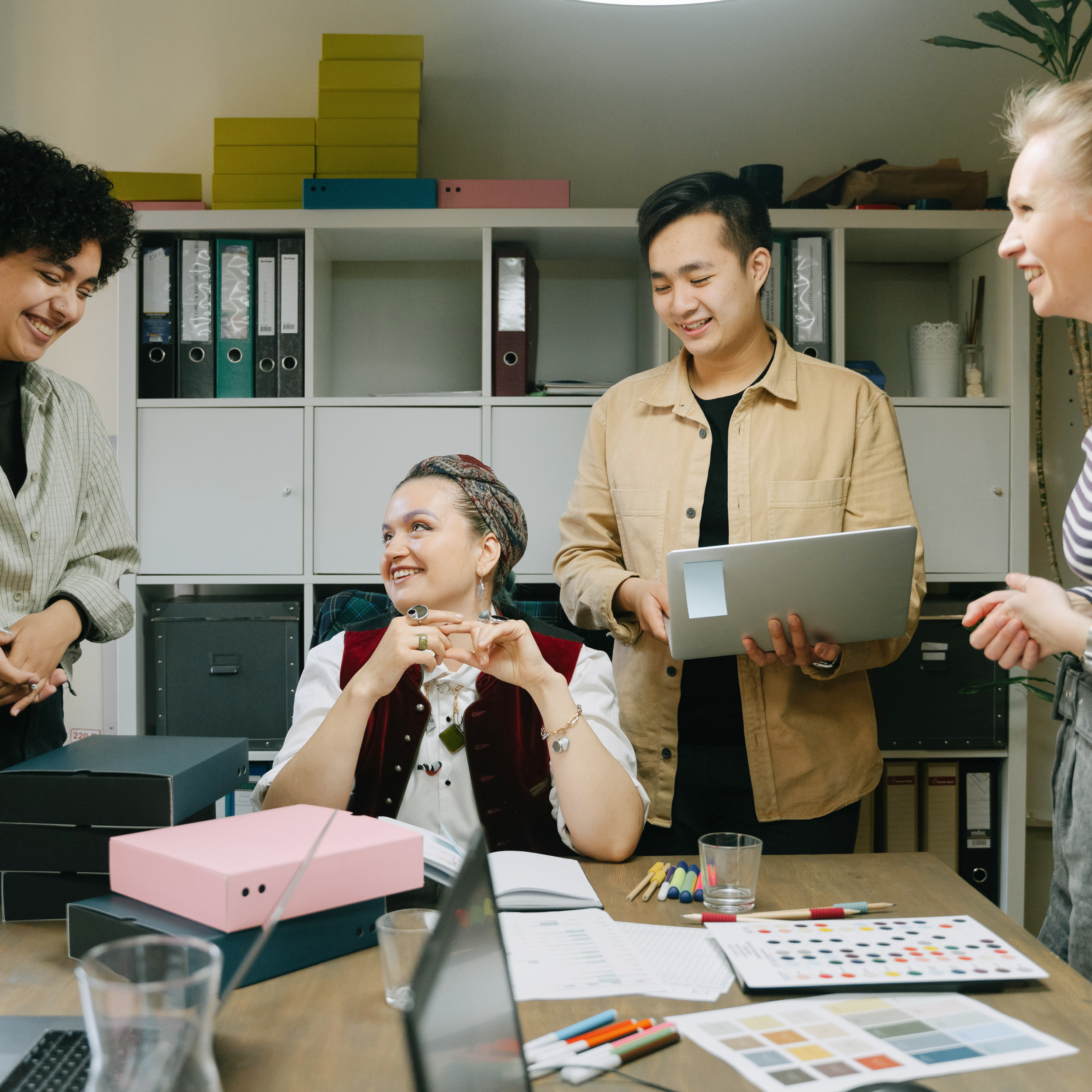 picture showing people at the office chatting
