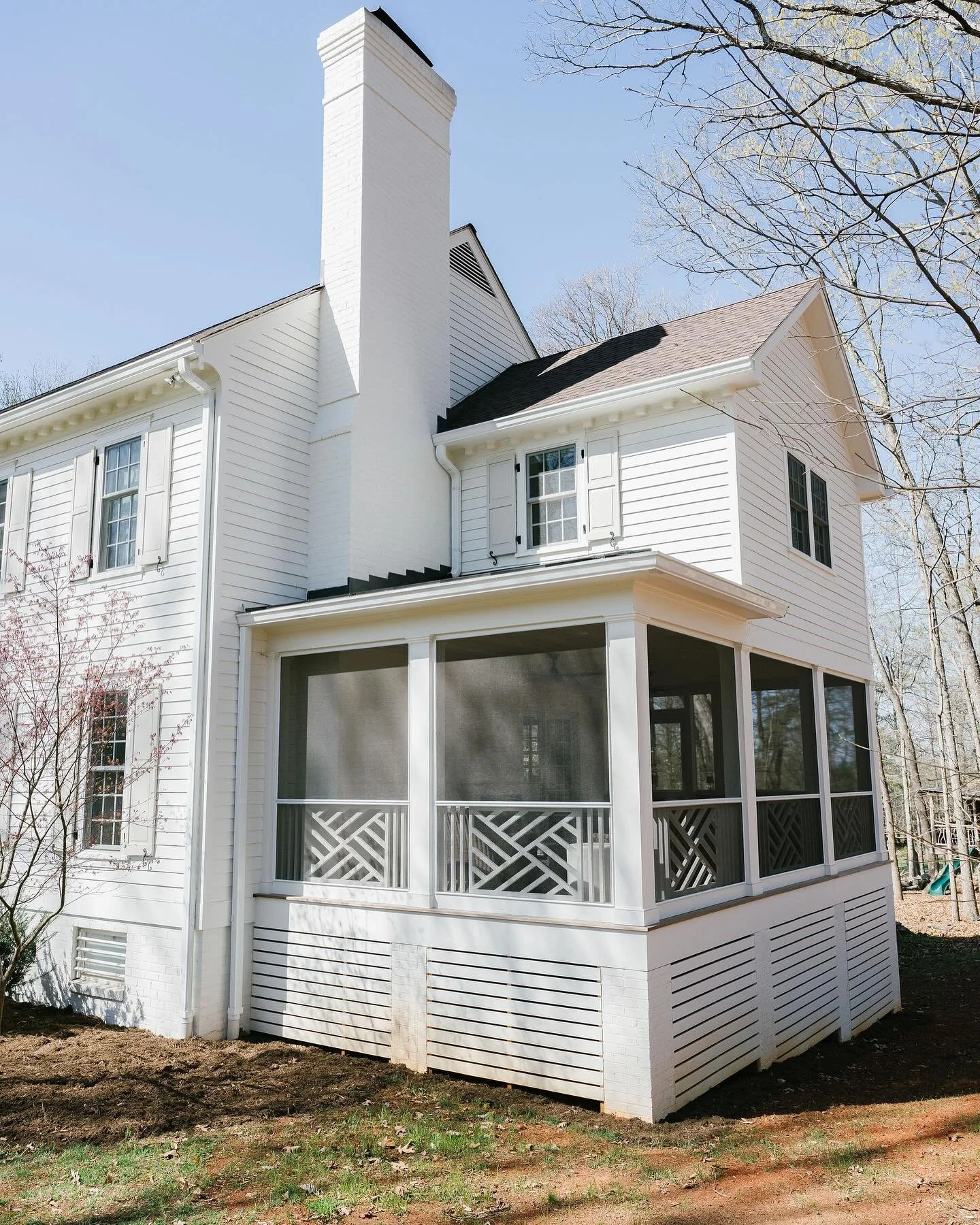 This whole house renovation included a screen porch addition with an additional bedroom above. Perfect for this growing family!