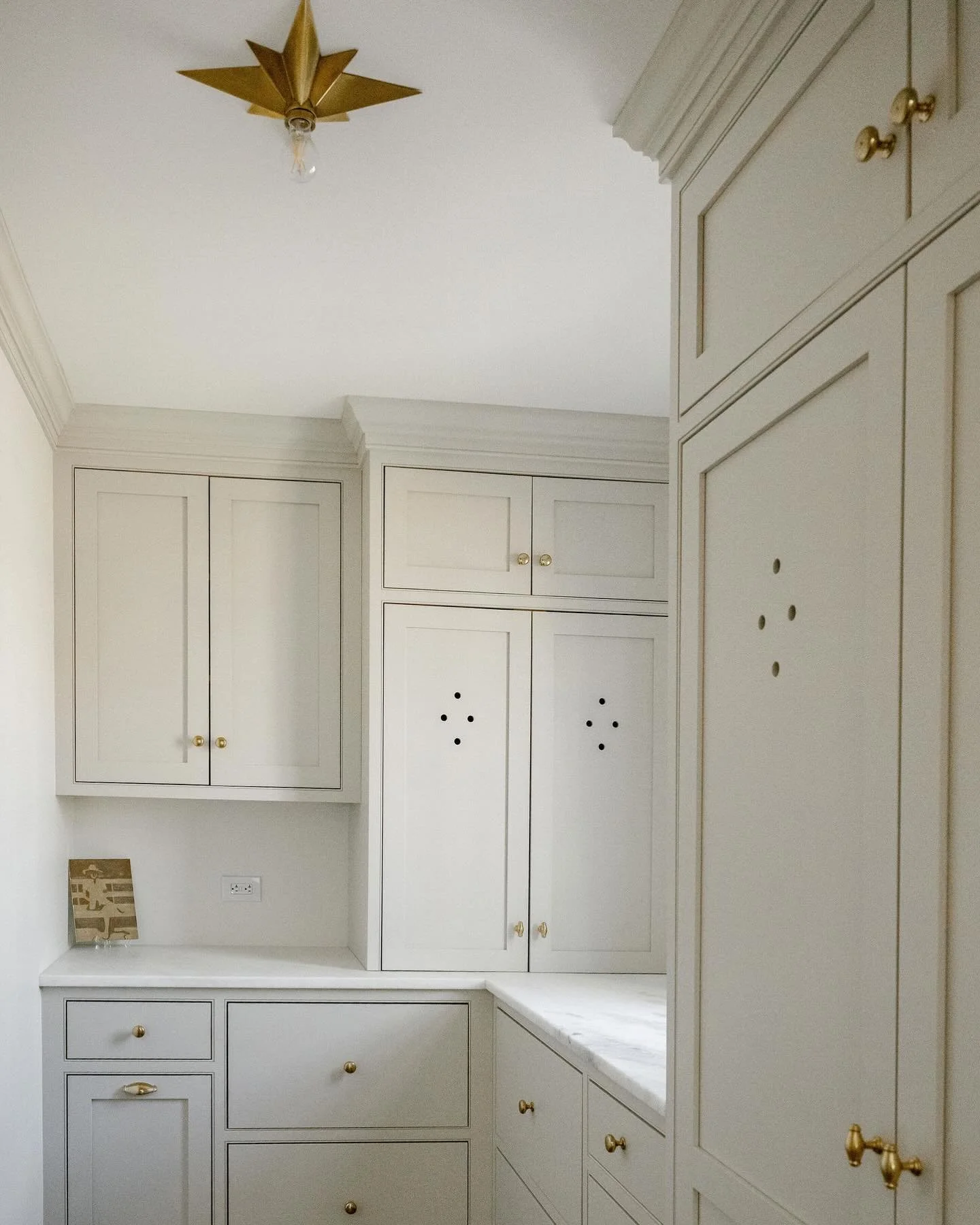 Designed as an extension of the kitchen, this beautiful pantry provides much needed storage and bonus prep space for entertaining.