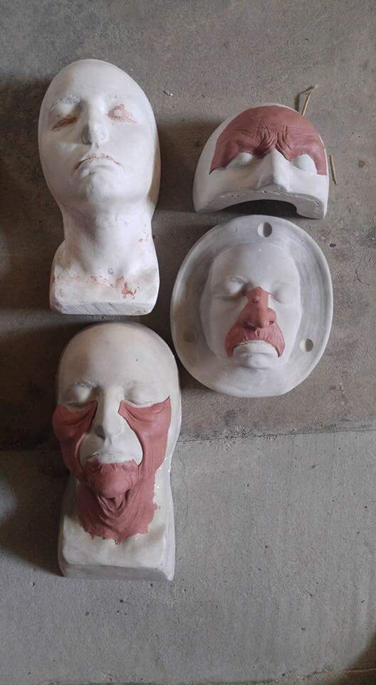 The original sculpt was sliced at the different seams then submerged in water overnight. Once the hydrocal is fully saturated, the plastiline clay separates from it and is then placed on a new ultracal snap for molding.