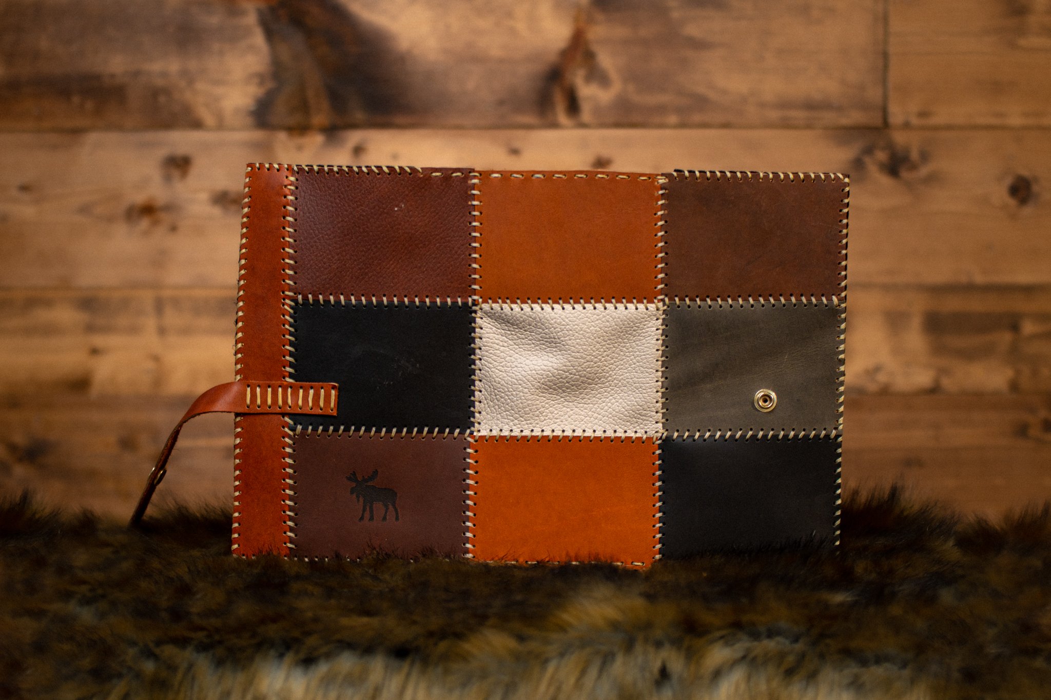 rainbow leather bible cover open on rustic backdrop (Copy)