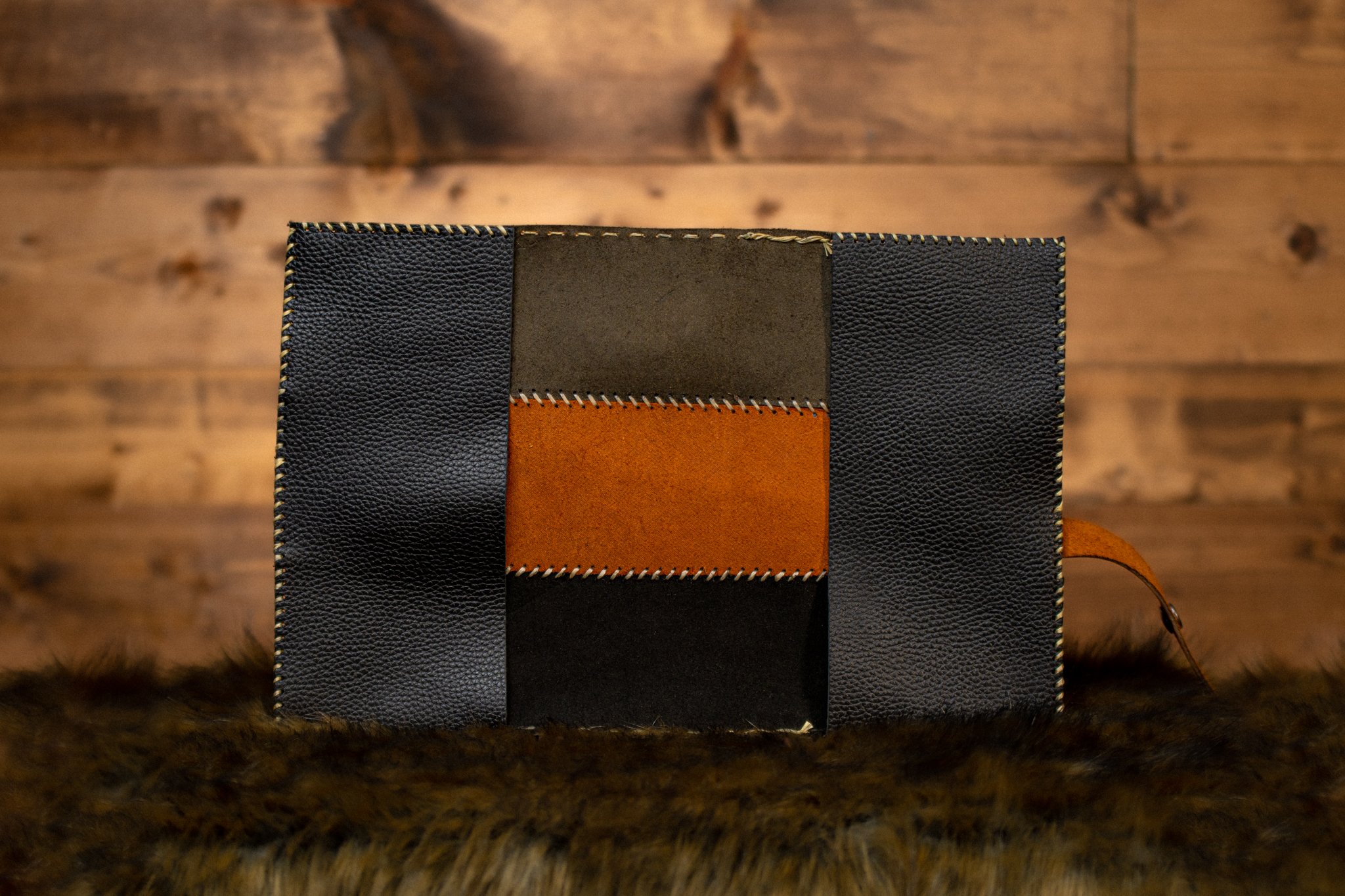 inside flaps of handmade multi colored cover on rustic background (Copy)