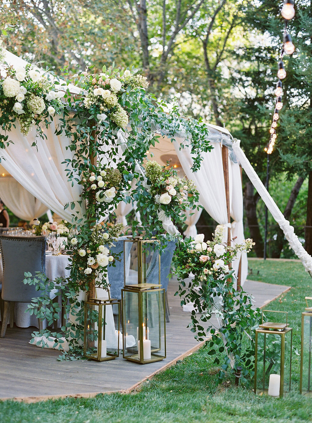 06-wedding- tent-entry-greenery-vines.jpg
