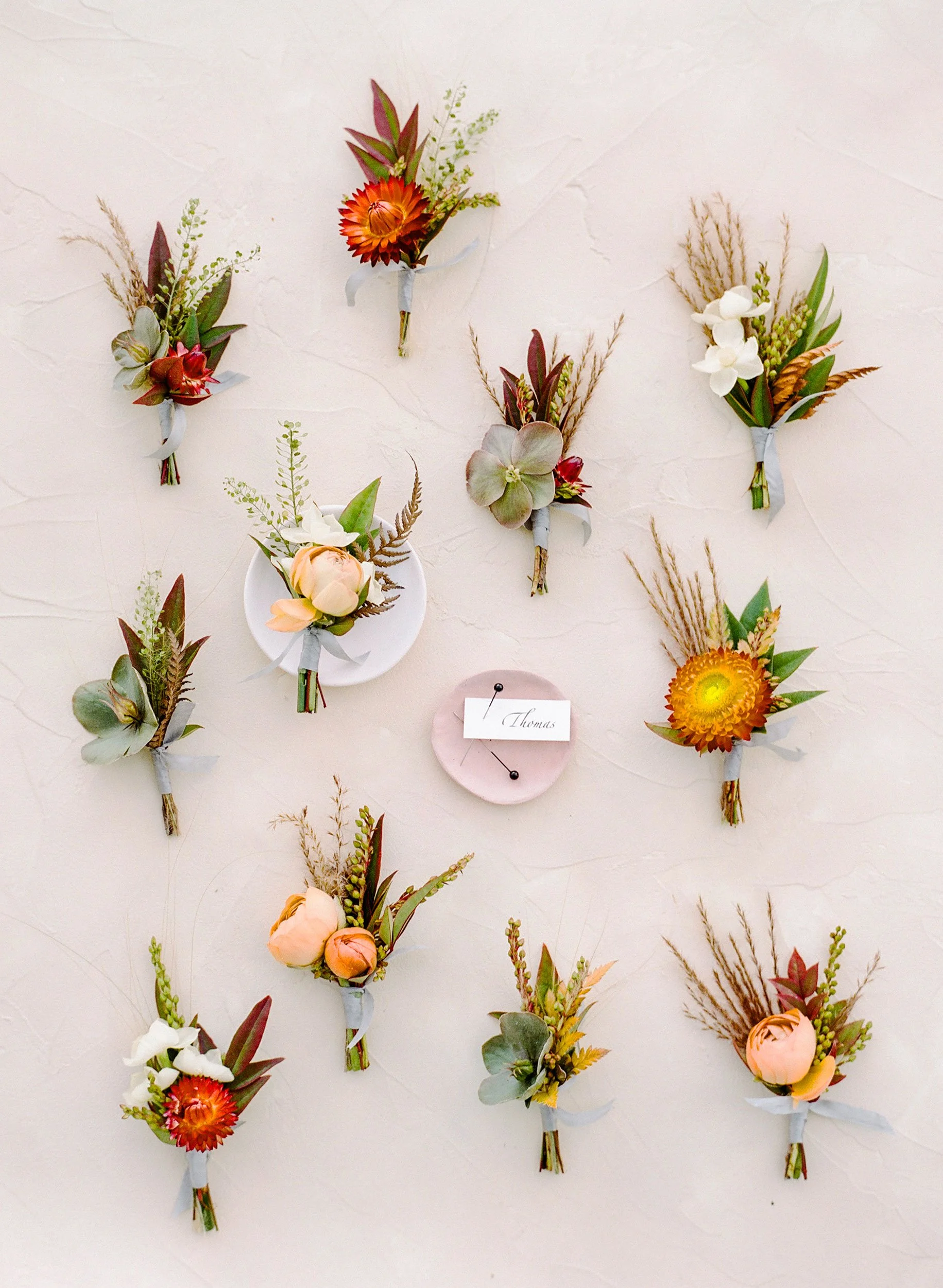 boutonnieres Solage wedding.jpg