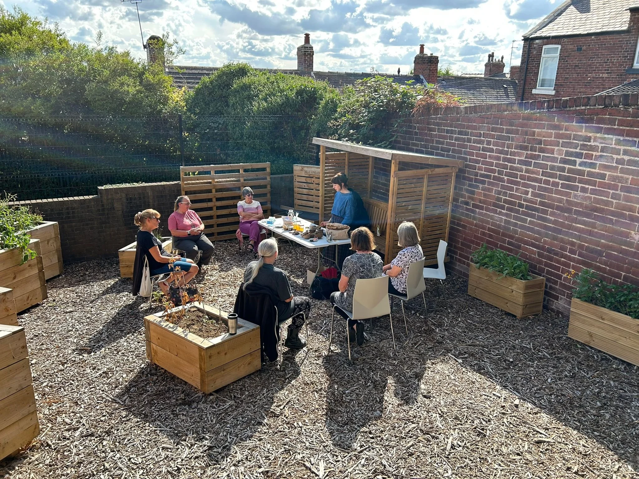 Weekly gatherings to explore workshops using the new community garden space