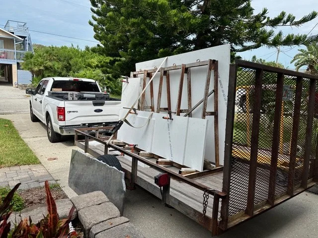 Material deliveries signaled progress as key selections arrived on site to bring the design vision to life.