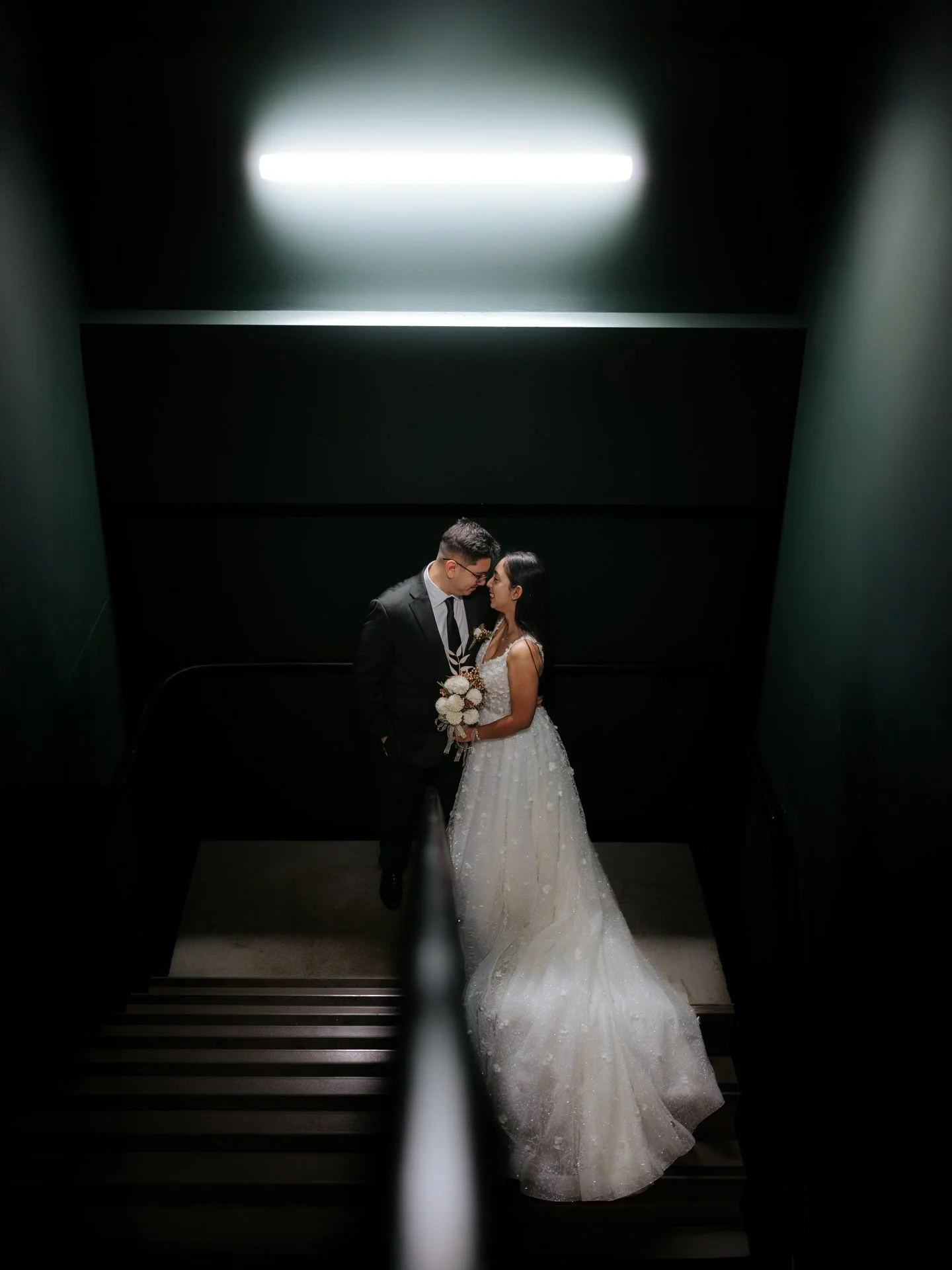 Who knew a staircase could be so magical with amazing light 😍

Yesterday&rsquo;s intimate wedding was chaotic to say the least. The blizzard and blowing winds really set us back a couple of hours but we were still able to come up some really great a