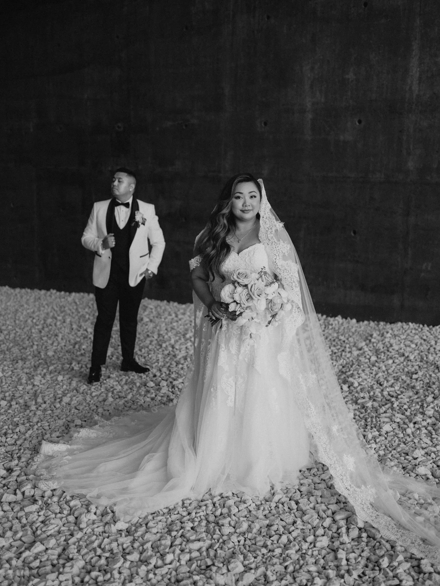 A quiet moment in the middle of everything.

I love creating space for couples to just breathe on their wedding day. The calm before the noise. The pause that makes the rest of the story feel even bigger. Black and white strips it all back to what ma