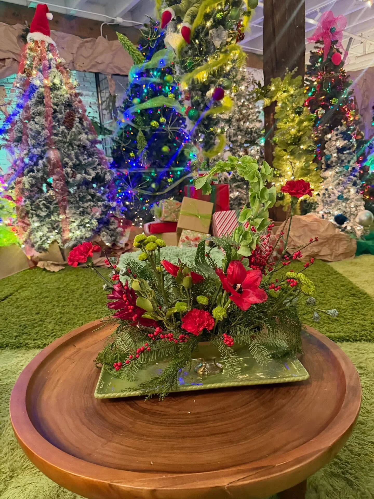 Who doesn&rsquo;t love some Grinch arrangements&hellip;..stop by and see us tomorrow at the Mistletoe Market @dairyblock!  Grab your Grinch flowers to go!