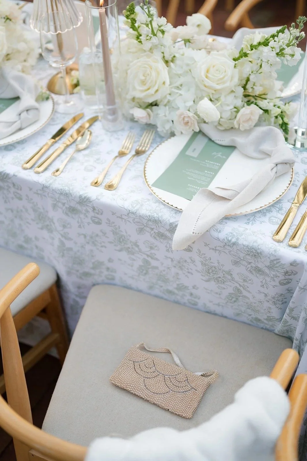 pastel blue and white wedding reception tablescape with white florals by JF Events & Flowers, an Orlando wedding florist and day-of coordinator
