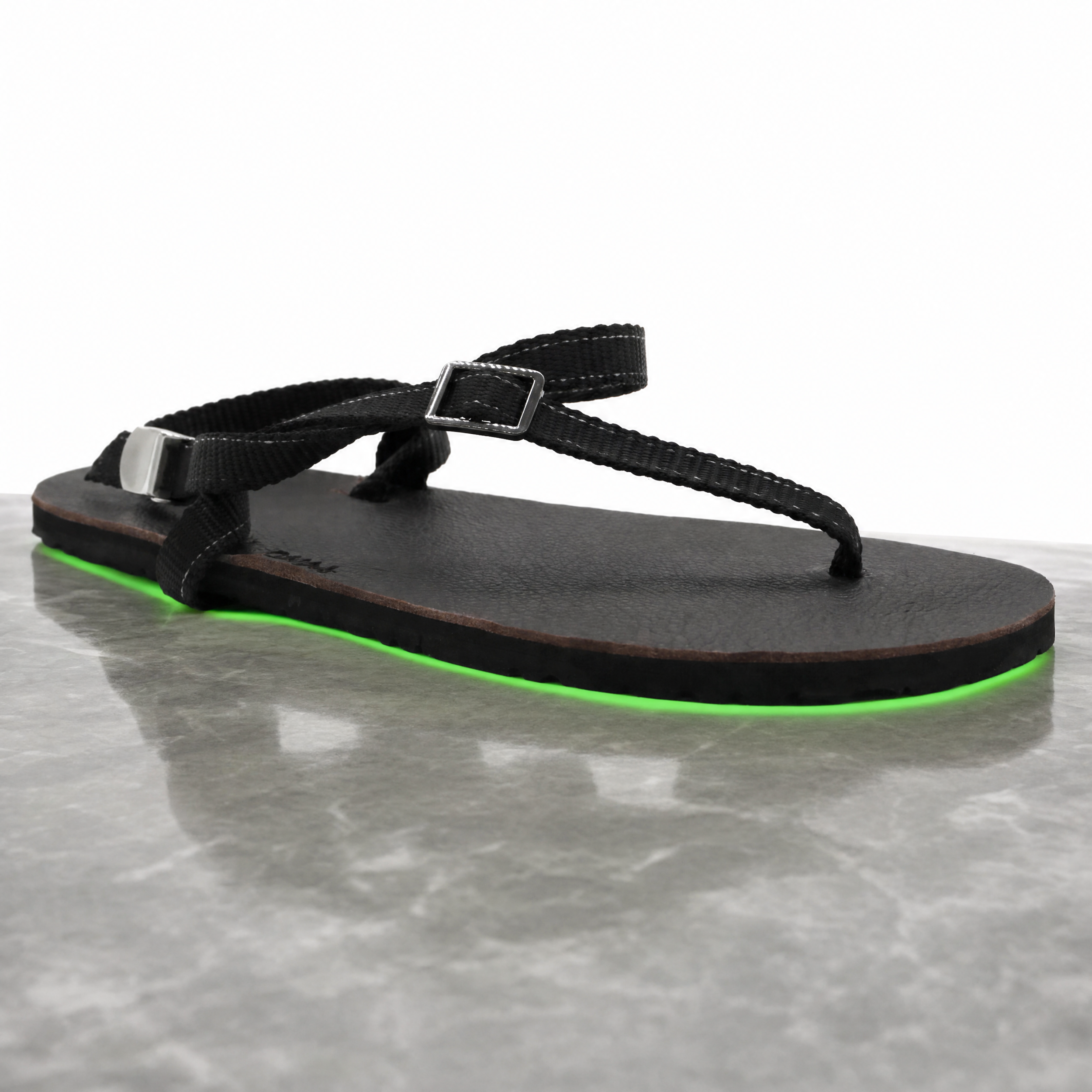 Agent%20Image%20-%20Take%20this%20exact%20sandal%20product%20photo%20and%20place%20it%20on%20a%20smooth_%20polished%20stone%20surface-2.png