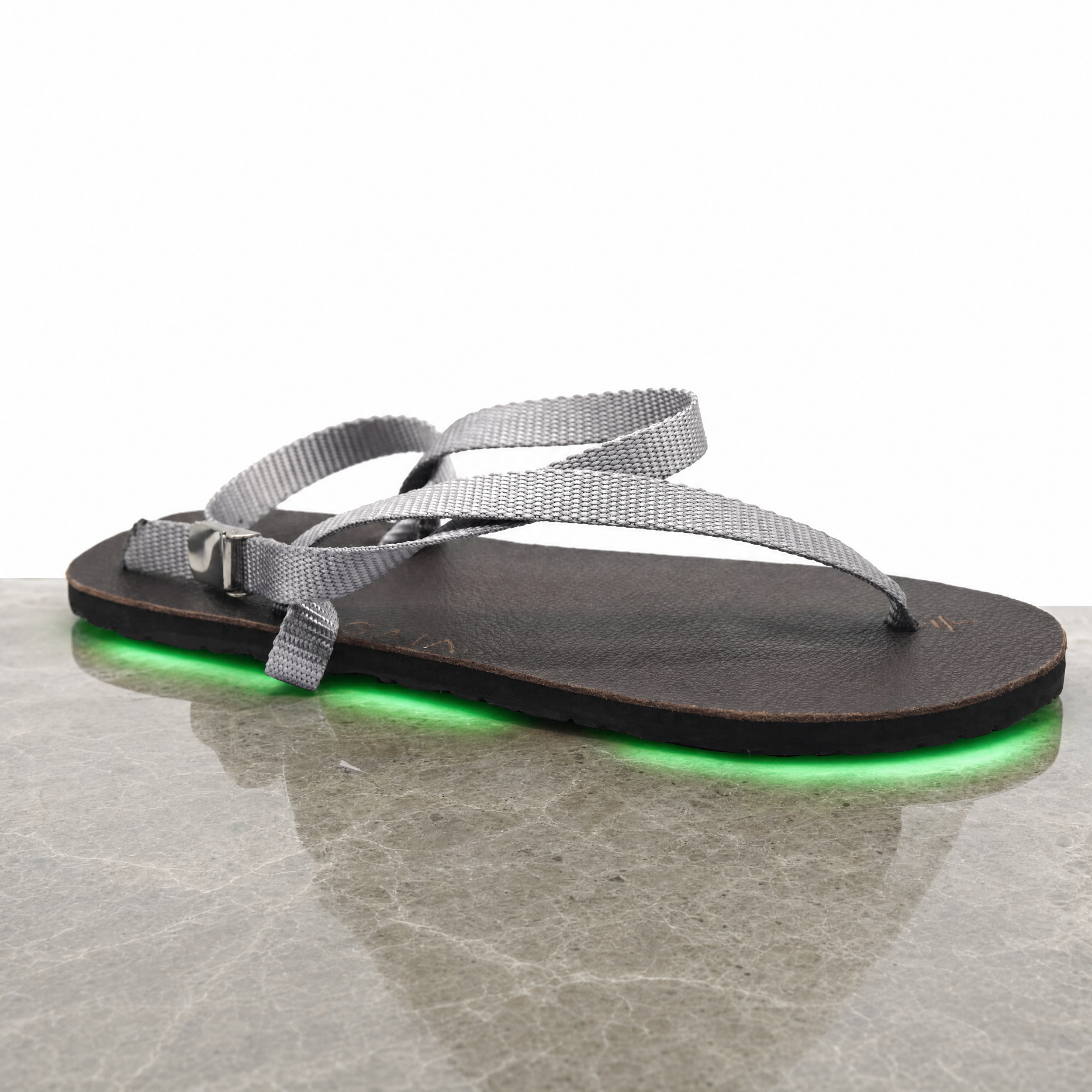 Agent%20Image%20-%20Take%20this%20exact%20sandal%20product%20photo%20and%20place%20it%20on%20a%20smooth_%20polished%20stone%20surface-20.png