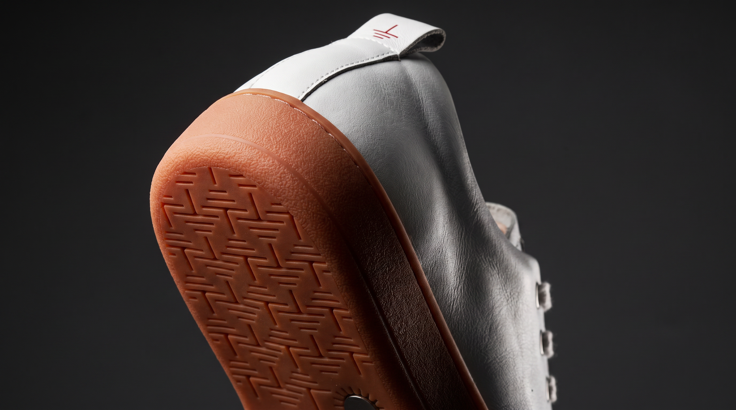 Agent%20Image%20-%20An%20extreme%20close-up%20studio%20shot%20of%20the%20ARES%20GROUNDWEAR%20sneaker_s%20terracotta%20gum%20sole%20a.png