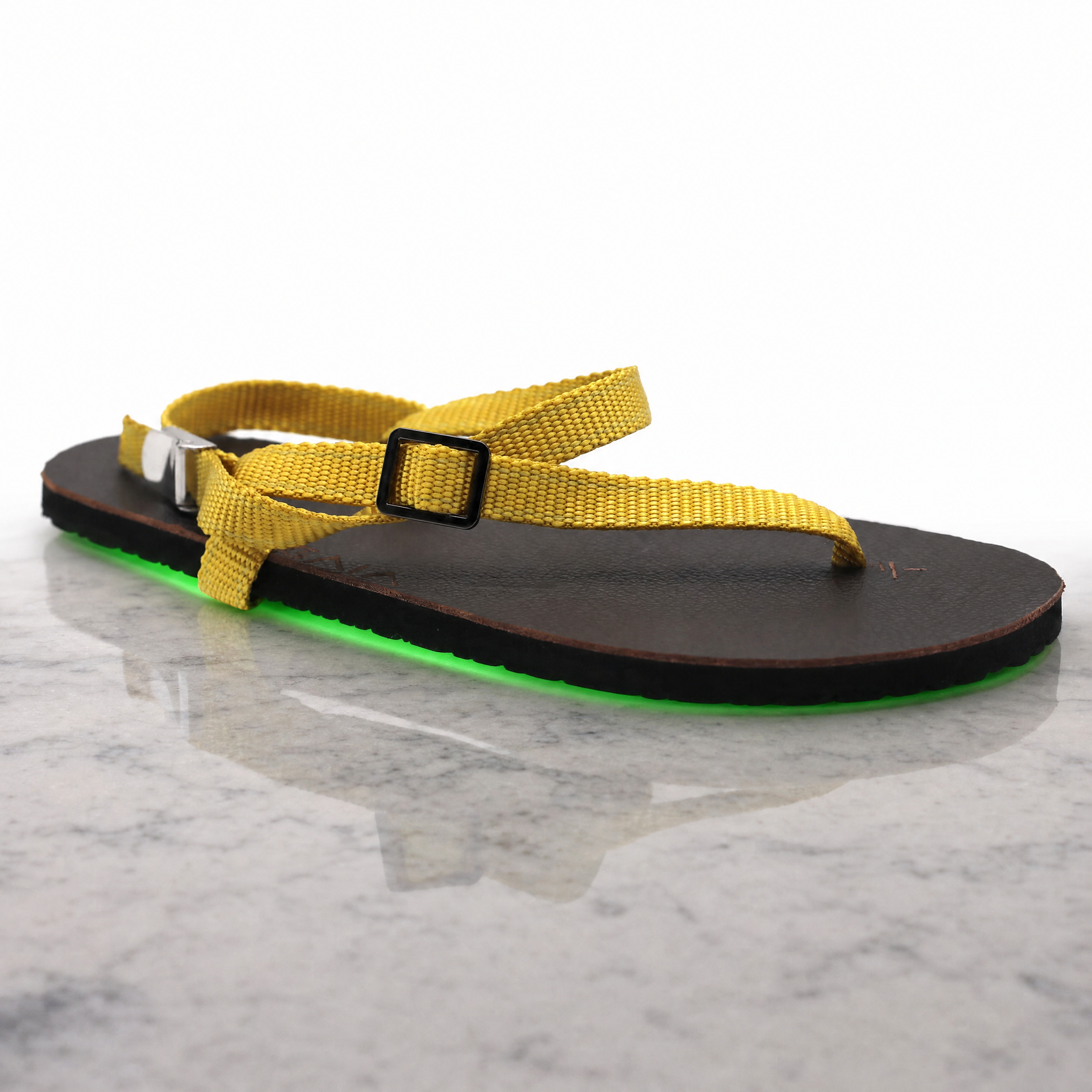 Agent%20Image%20-%20Take%20this%20exact%20sandal%20product%20photo%20and%20place%20it%20on%20a%20smooth_%20polished%20stone%20surface-26.png