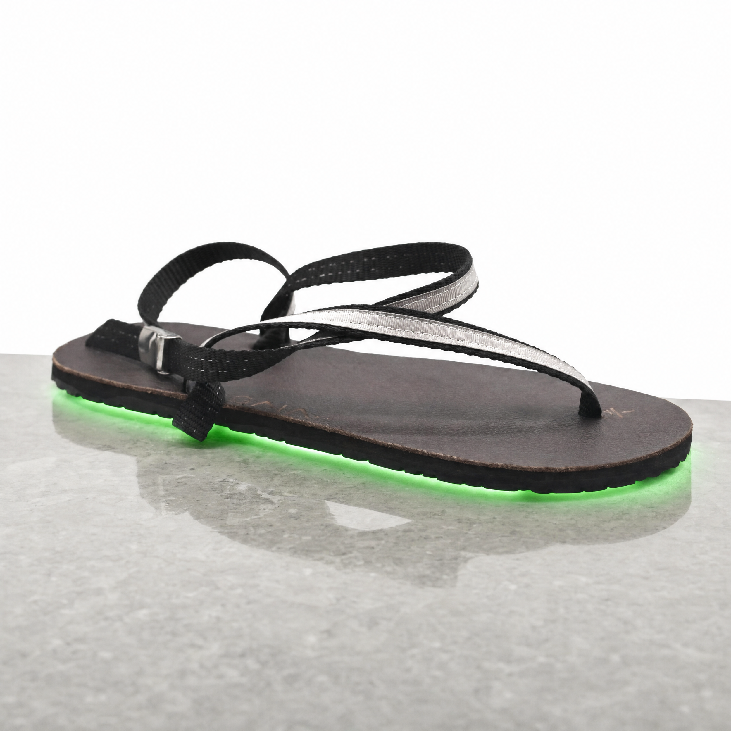 Agent%20Image%20-%20Take%20this%20exact%20sandal%20product%20photo%20and%20place%20it%20on%20a%20smooth_%20polished%20stone%20surface-9.png