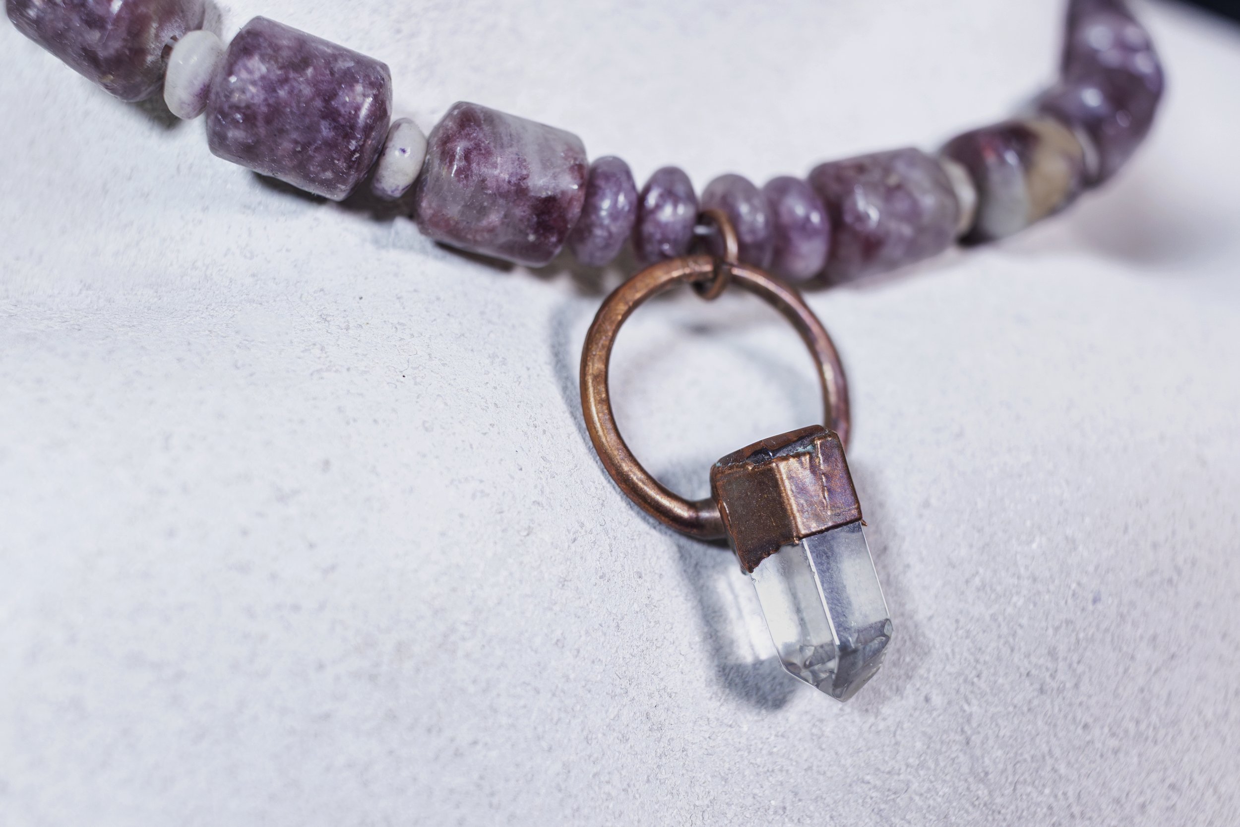 lepidolite and crystal brass.jpg