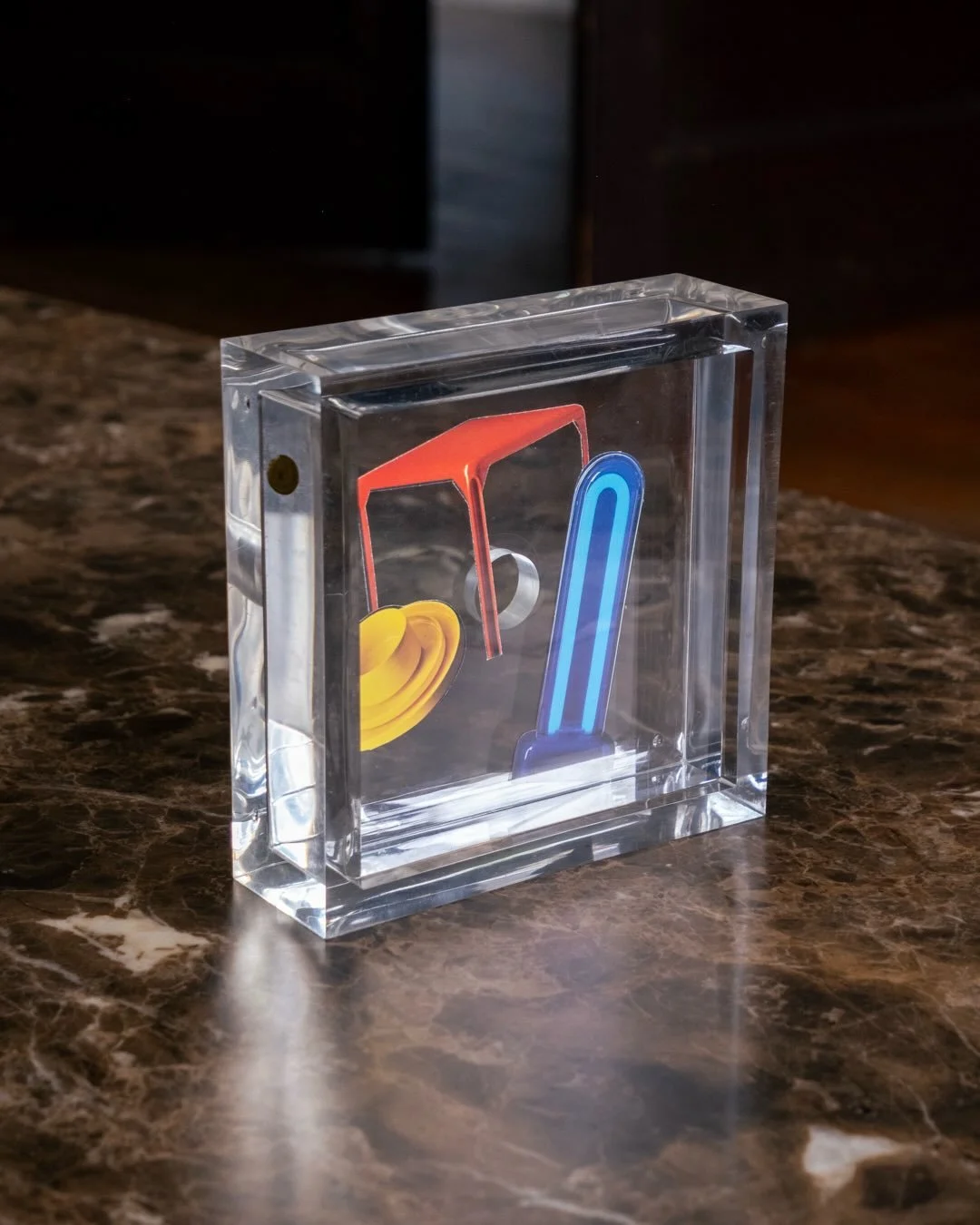 Fratelli Guzzini Lucite Picture Frame by Fabio Manlio Ciocca, 1960s

A timeless example of Italian modernist plastic design from Guzzini&rsquo;s golden era of material experimentation.  Crafted from heavy polished solid cast acrylic allowing light to