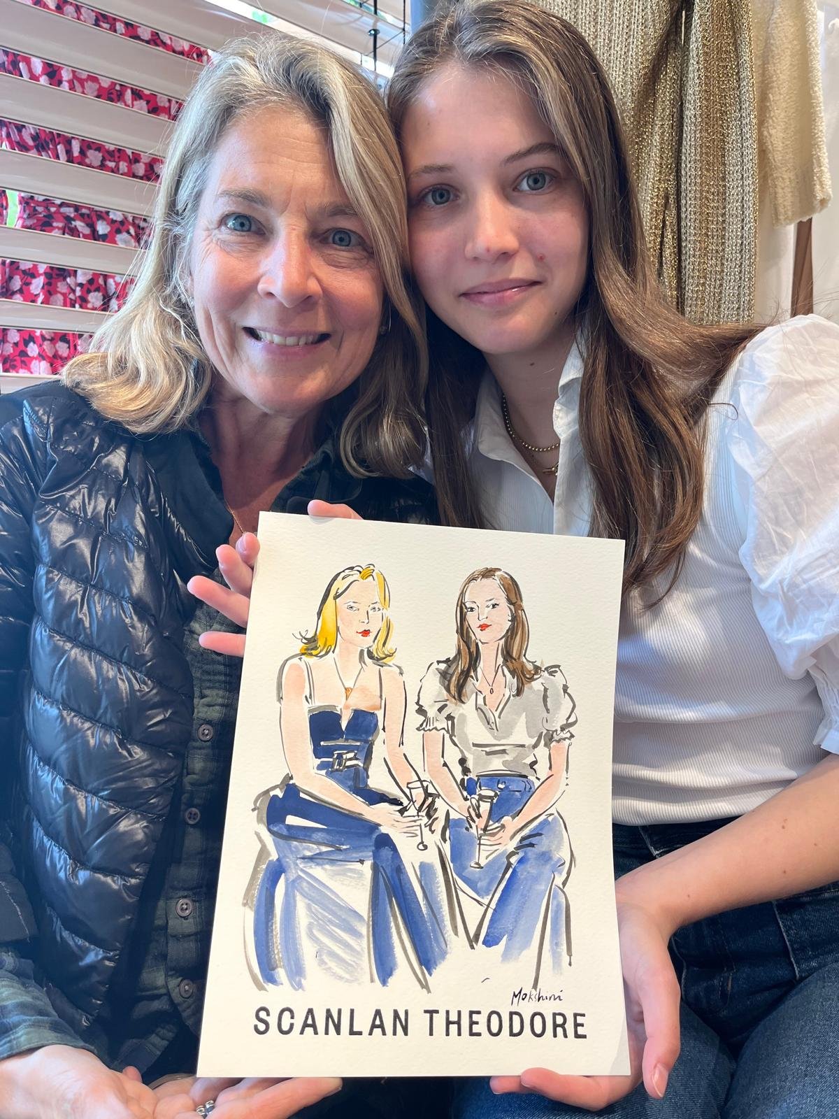 Guests holding their sketch