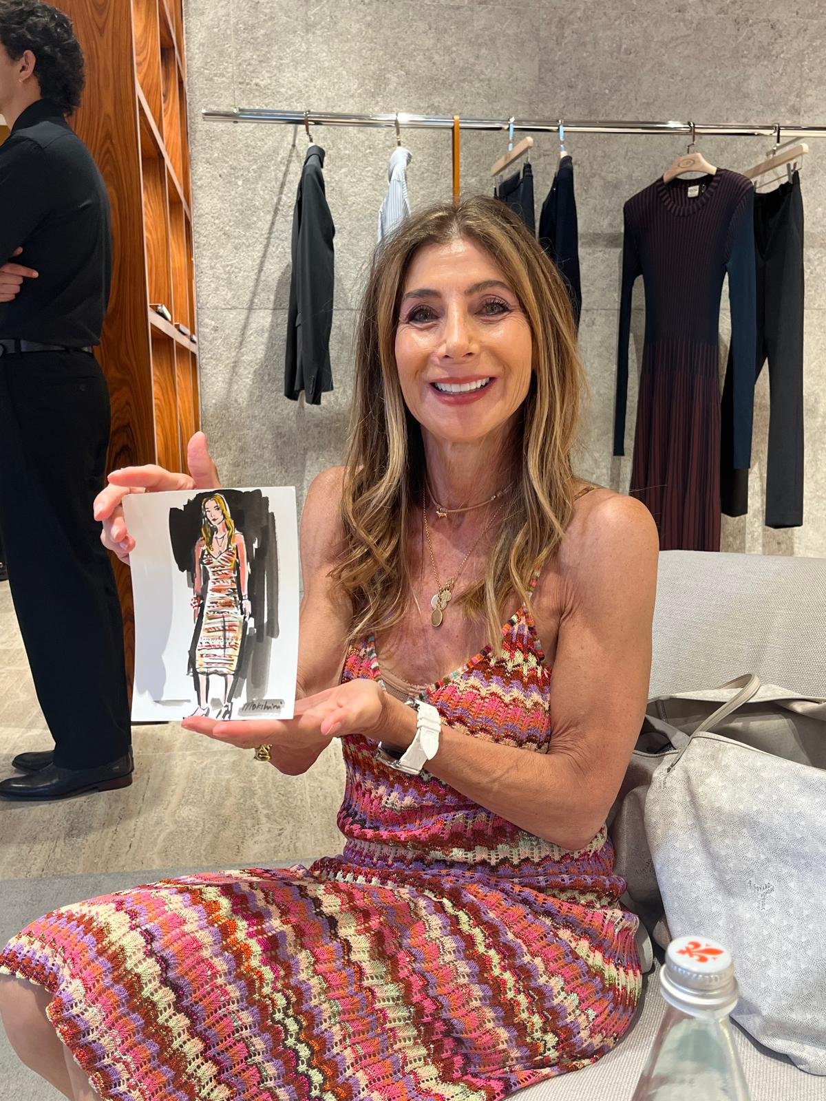 Guest holding her sketch