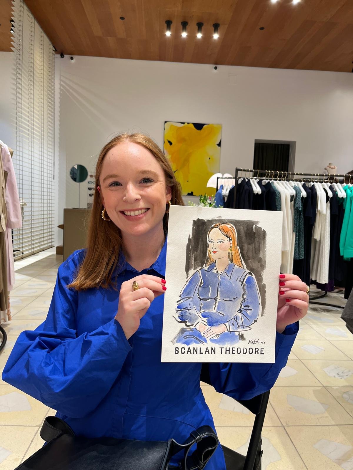 Guest holding her sketch