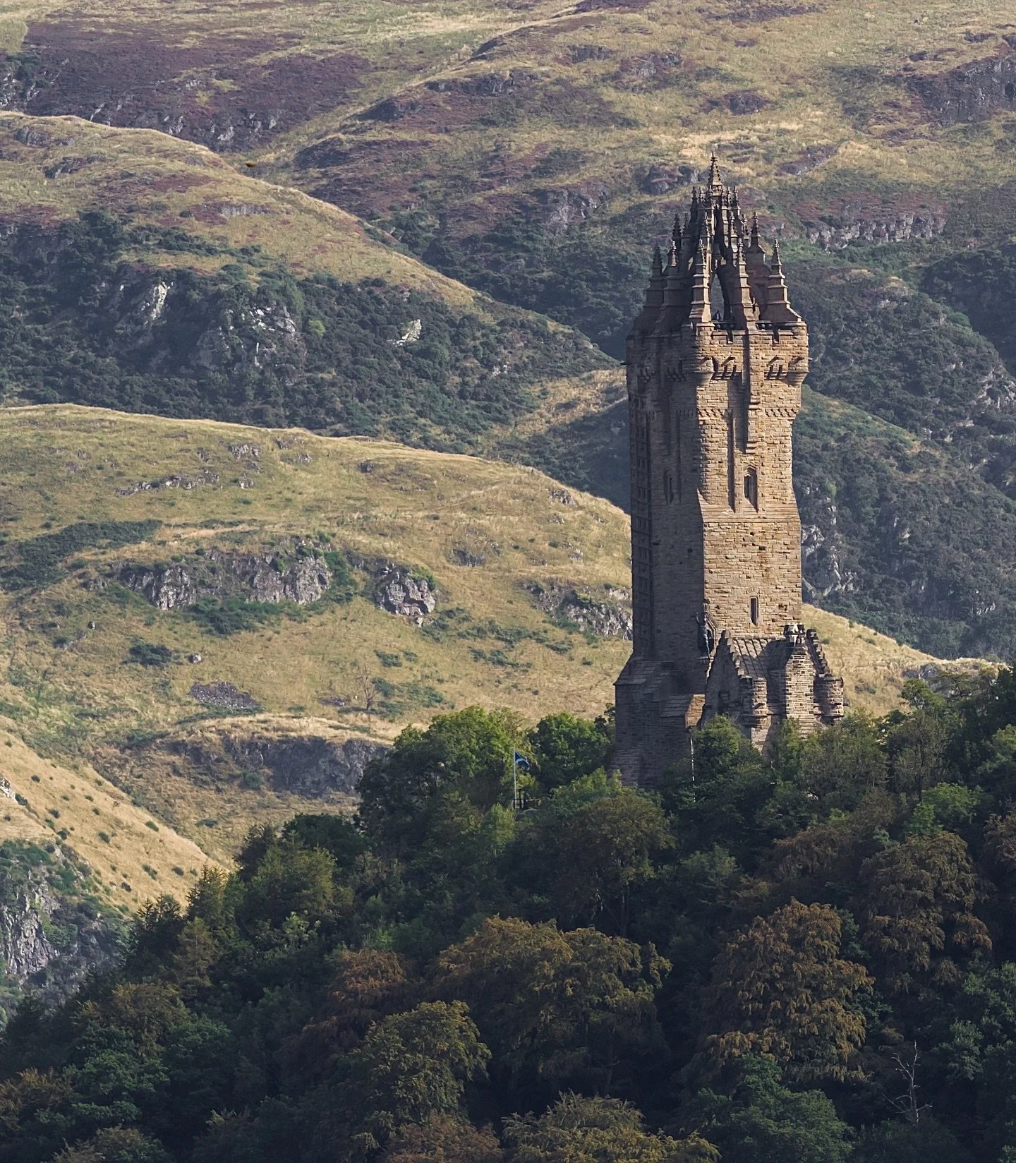 Wallace monument 

An iconic building commemorating William Wallace, with a stunning backdrop! 
This stunning tower is only 10 minutes from us and well worth a visit. 
Would you climb the 246 steps to the top? 
#wallacemonument #scottishhistory #tree