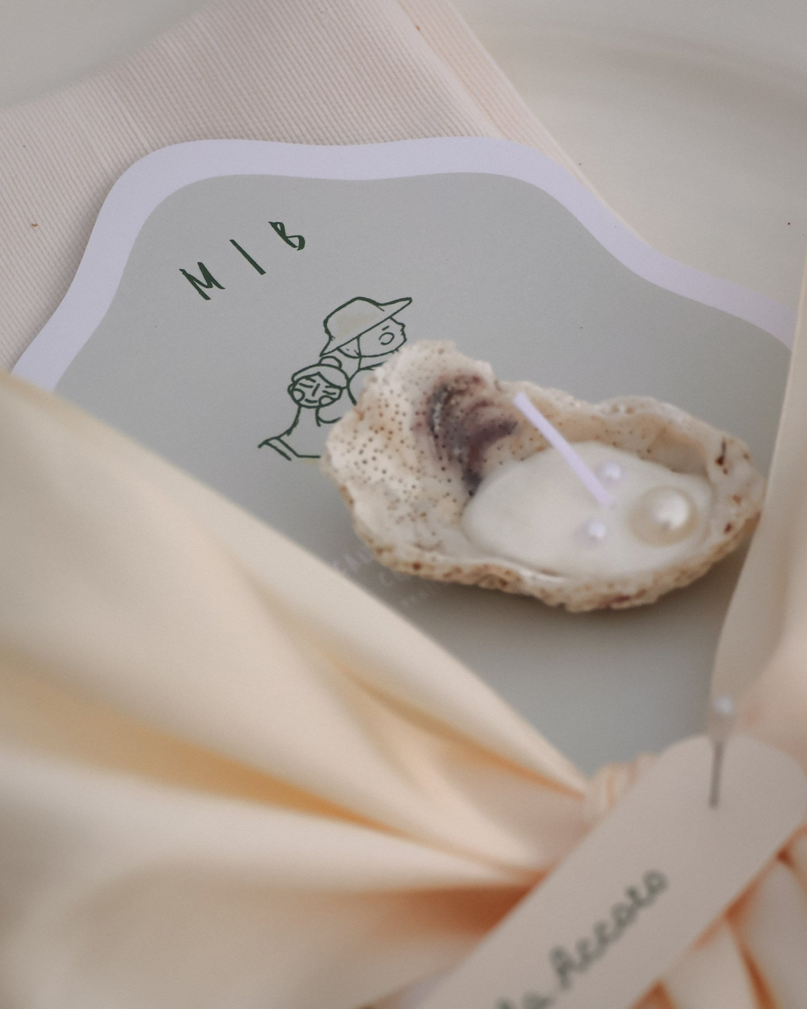 dettaglio mise en place candela conchiglia 