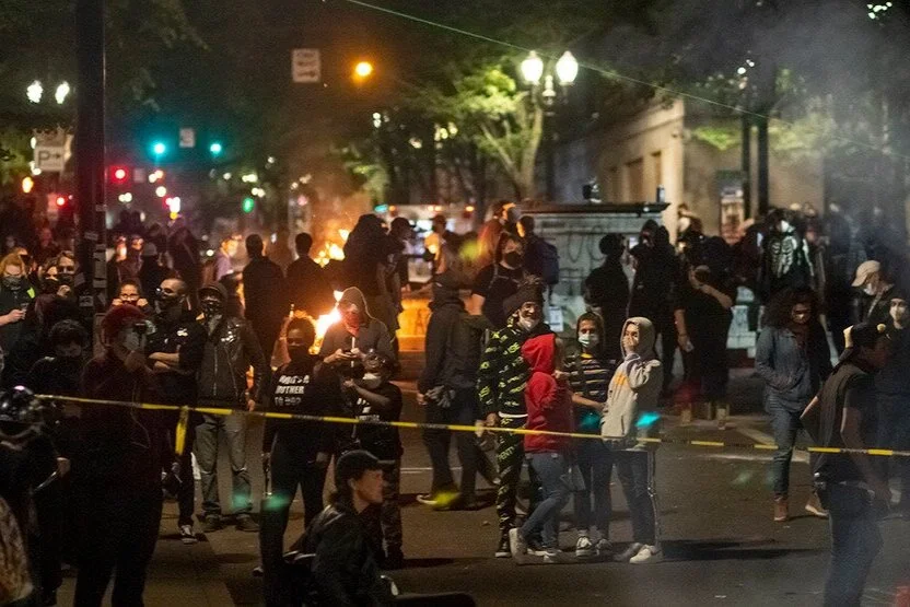 Portland Individuals Labeled As "Press" Throw Objects At Police