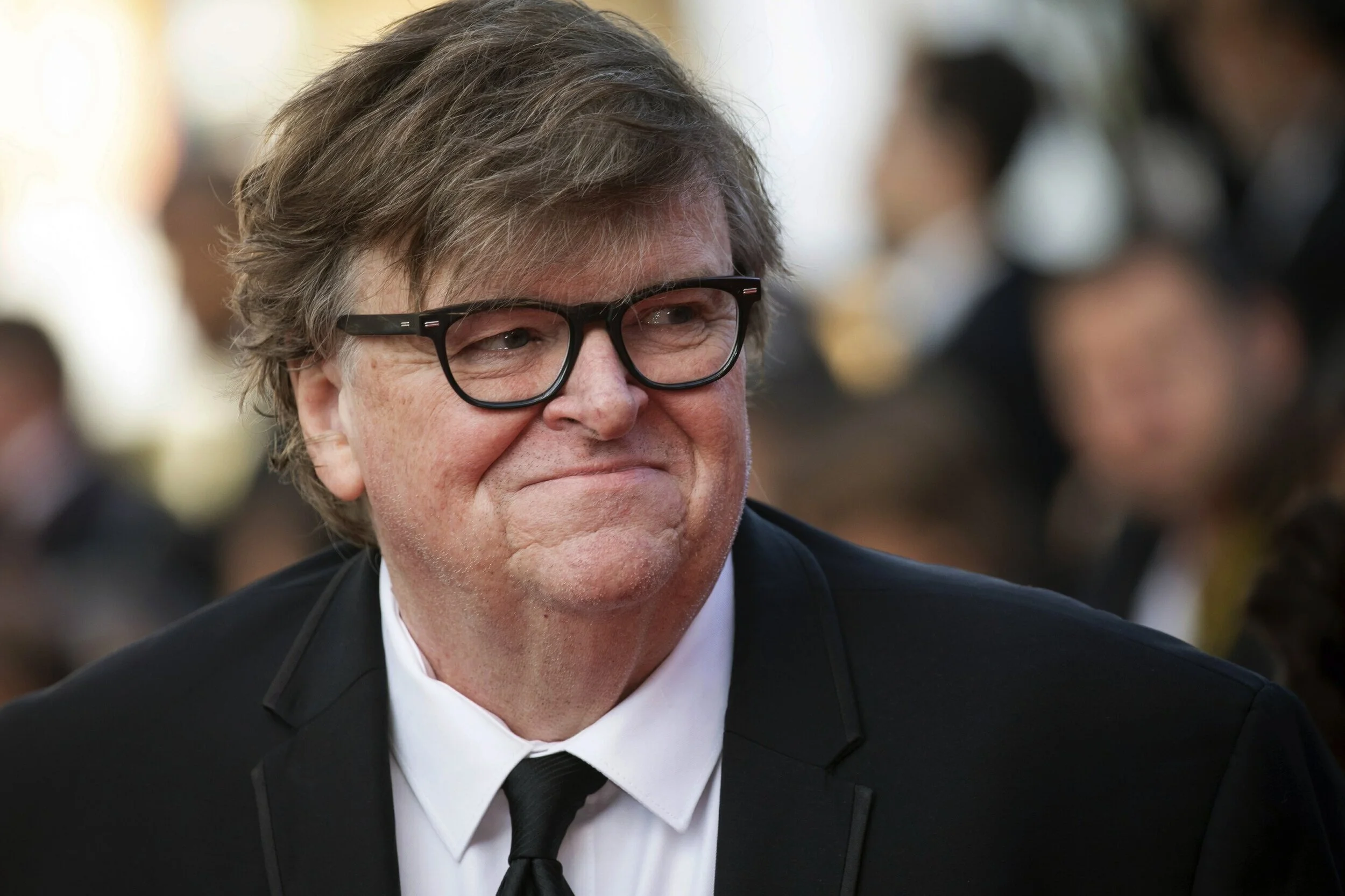 LISTEN: Michael Moore Says Police Should Be Vetted In Terms Of Their Racism