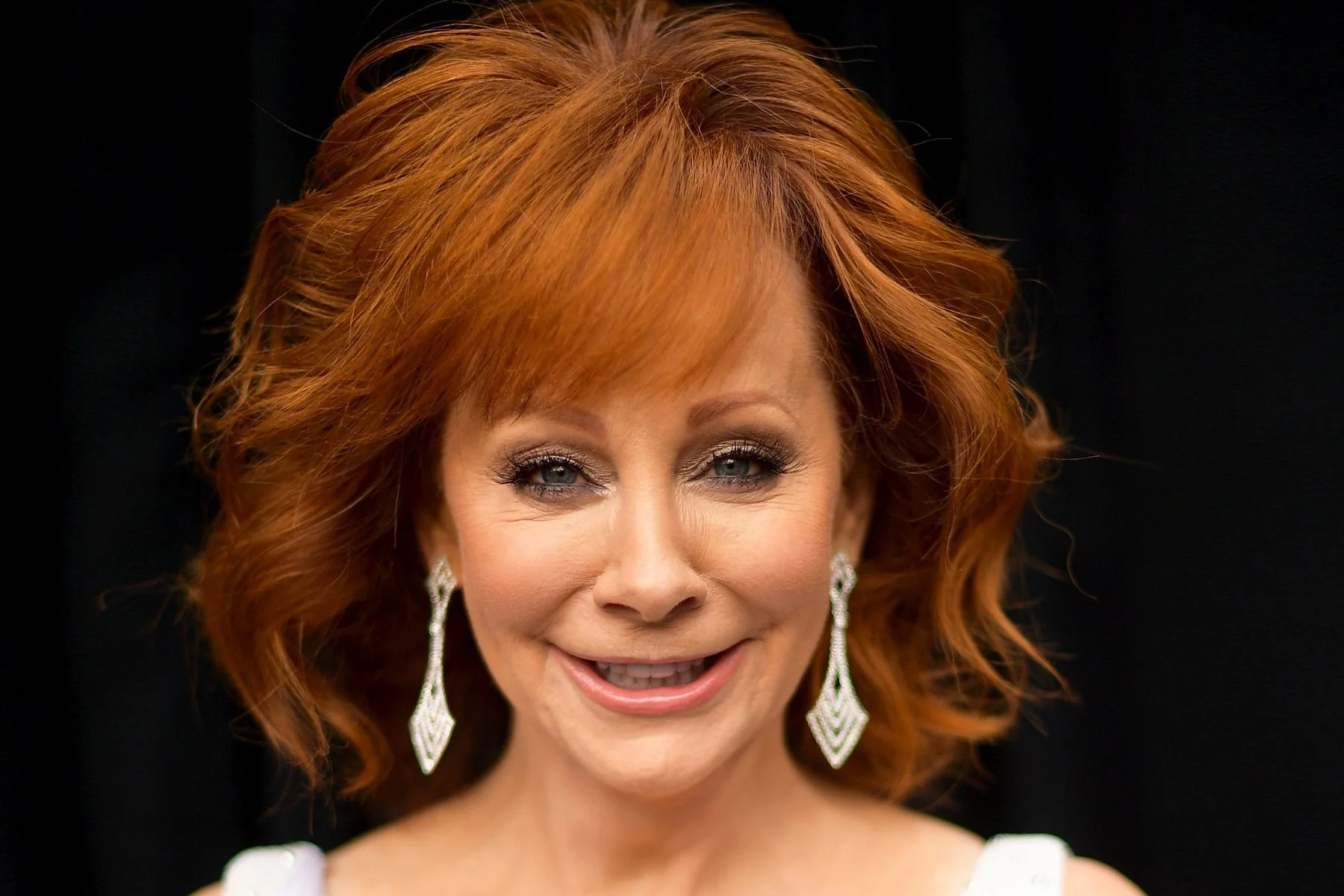 Vaccinated singer Reba McEntire has contracted COVID
