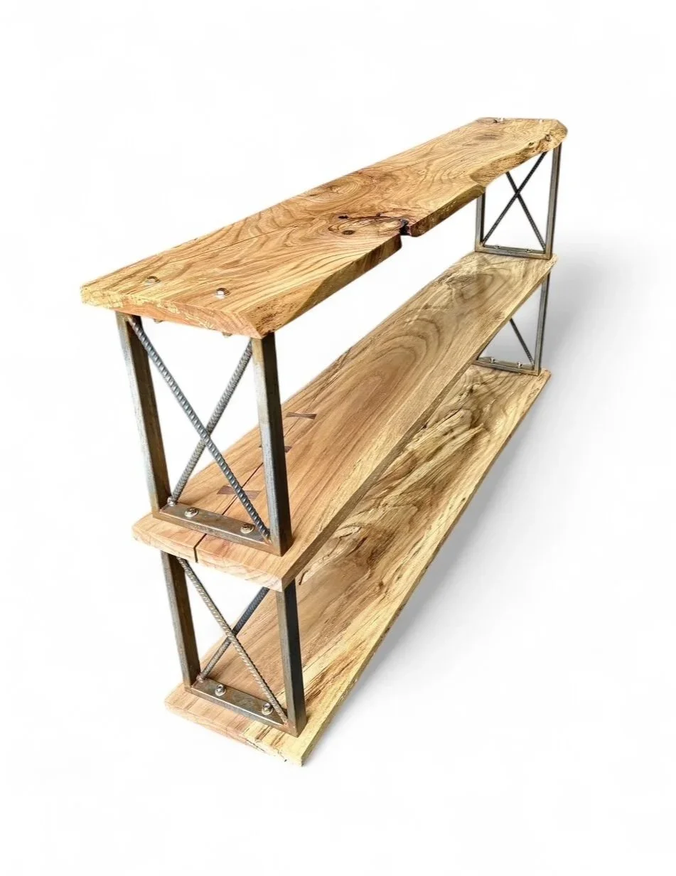 Three wooden shelves with metal braces on a white background.