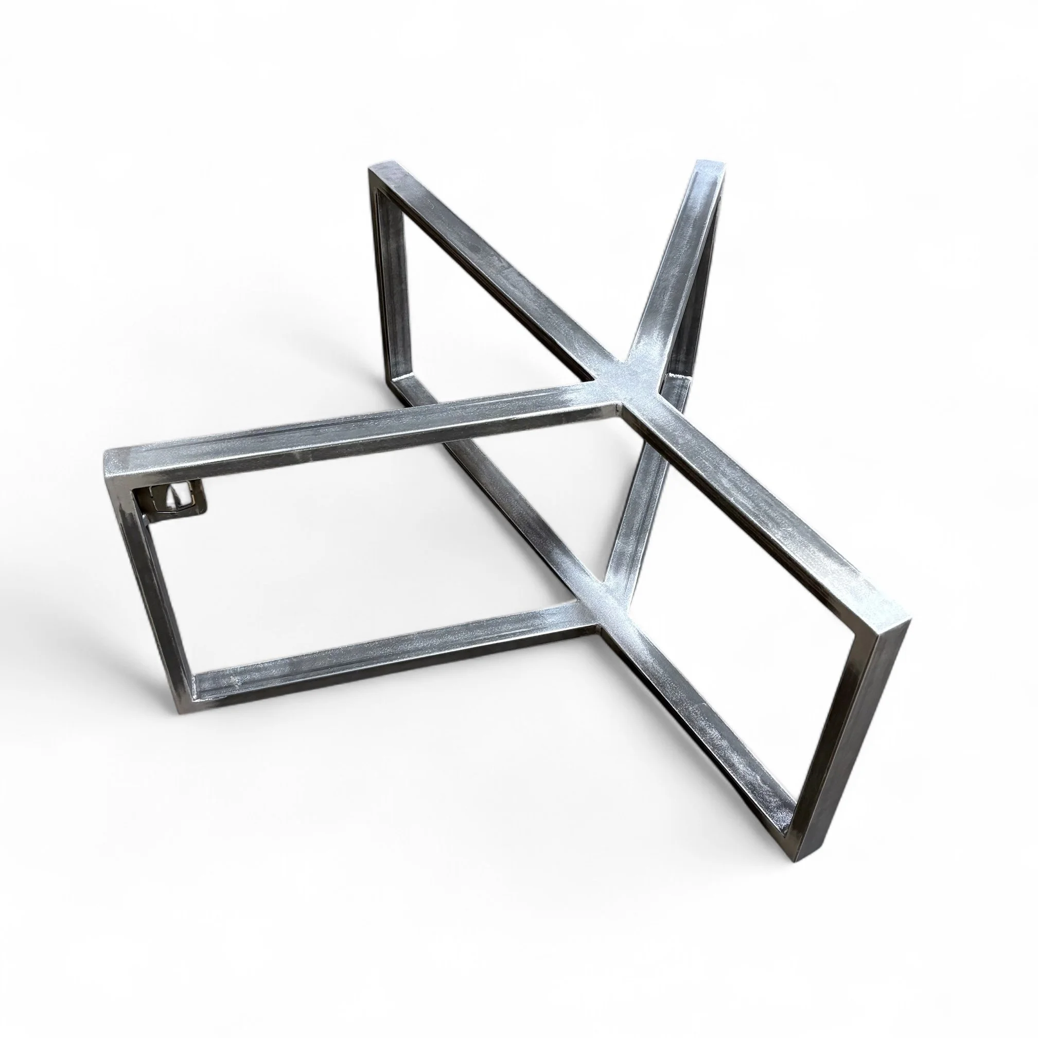 Metallic frame structure with rectangular and triangular shapes on a white background.