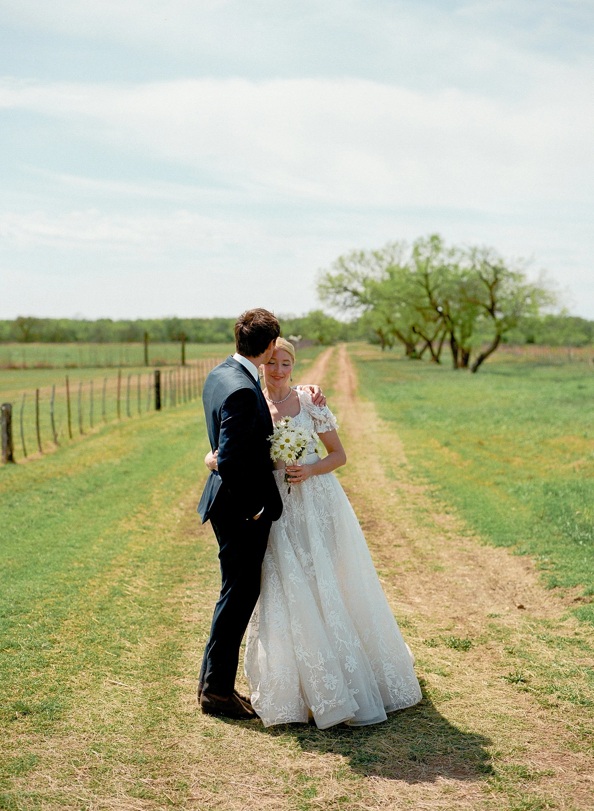 Bride and Groom Photographed on Film at their family ranch in Fredericksburg, Texas