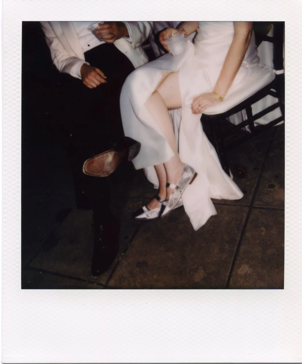 Polaroid of a Wedding Couple sharing a drink at Laguna Gloria in Austin
