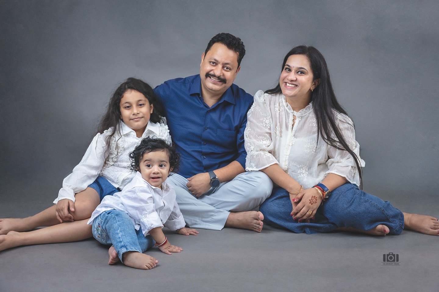 A quiet kind of love&mdash;the one that sits close, laughs easy, and grows together 🤍 

#FamilyPortraits #LuxuryFamilyPhotography #WondersByTheMemoryTrunk #TimelessMoments #StudioPortraits 

[family photoshoot jammu, luxury family photography, studi