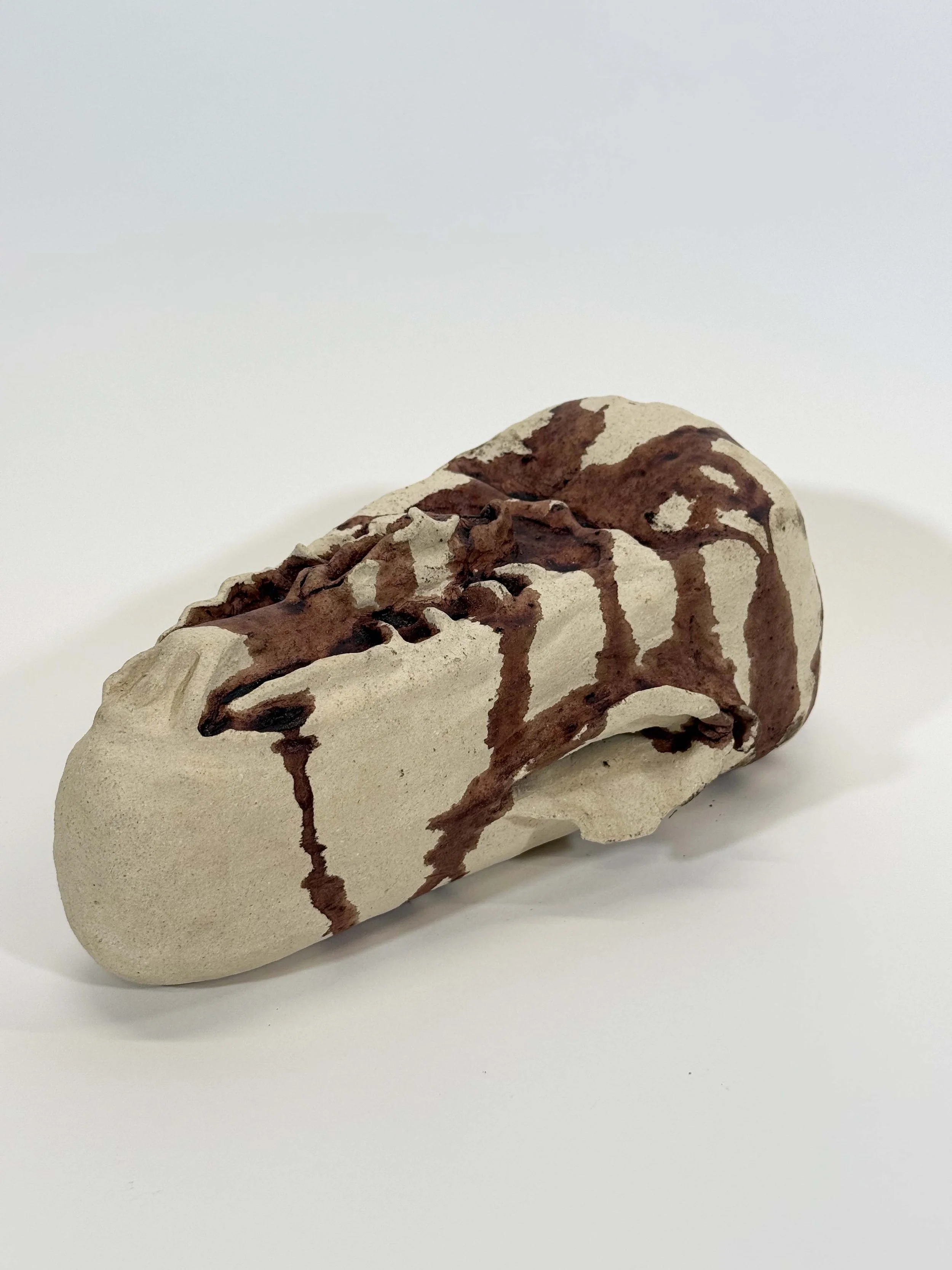 Untitled, Stoneware Clay with Menstrual Blood, 5 x 6.8 x 12.5 in, 2025.