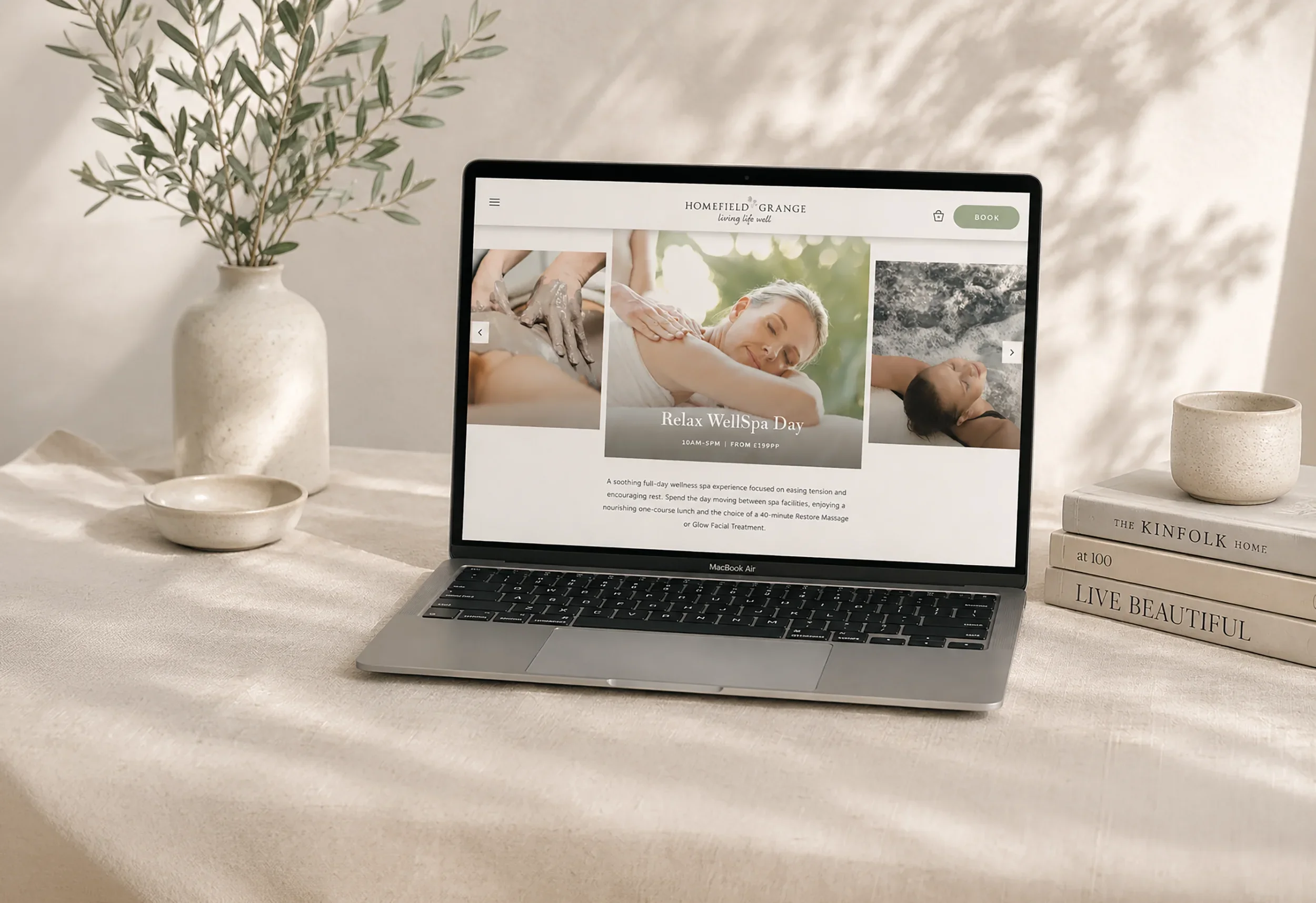 Homefield Grange WellSpa Day website page displayed on a laptop, featuring spa experiences within the refreshed brand identity.