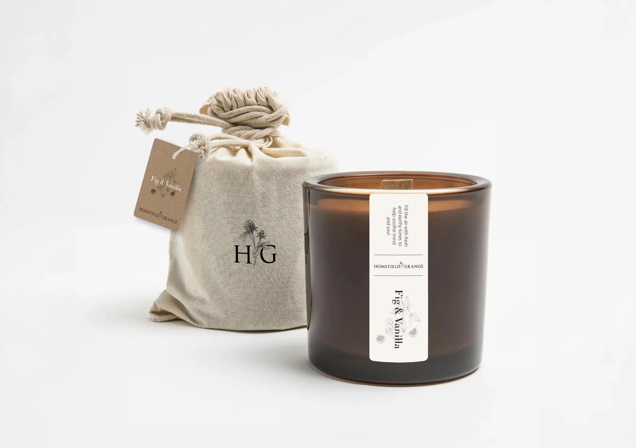 Homefield Grange Fig & Vanilla candle and branded gift packaging, created as part of the wellness retreat brand experience.