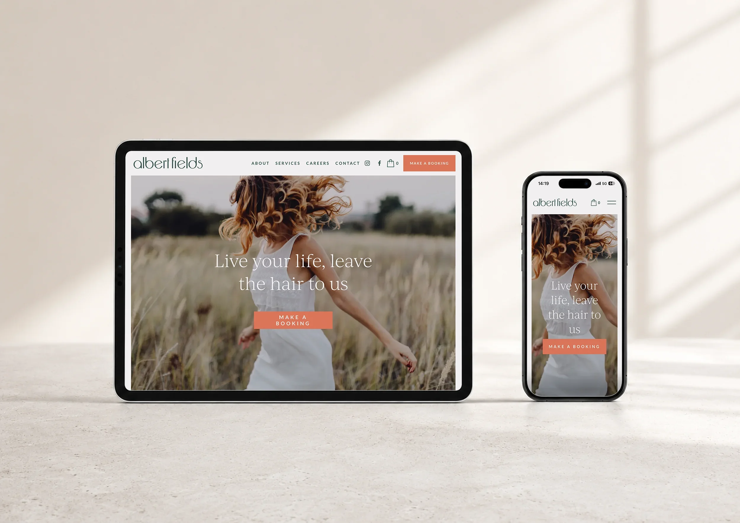 Albert Fields salon website shown on tablet and mobile, featuring the ‘Live your life, leave the hair to us’ brand message.