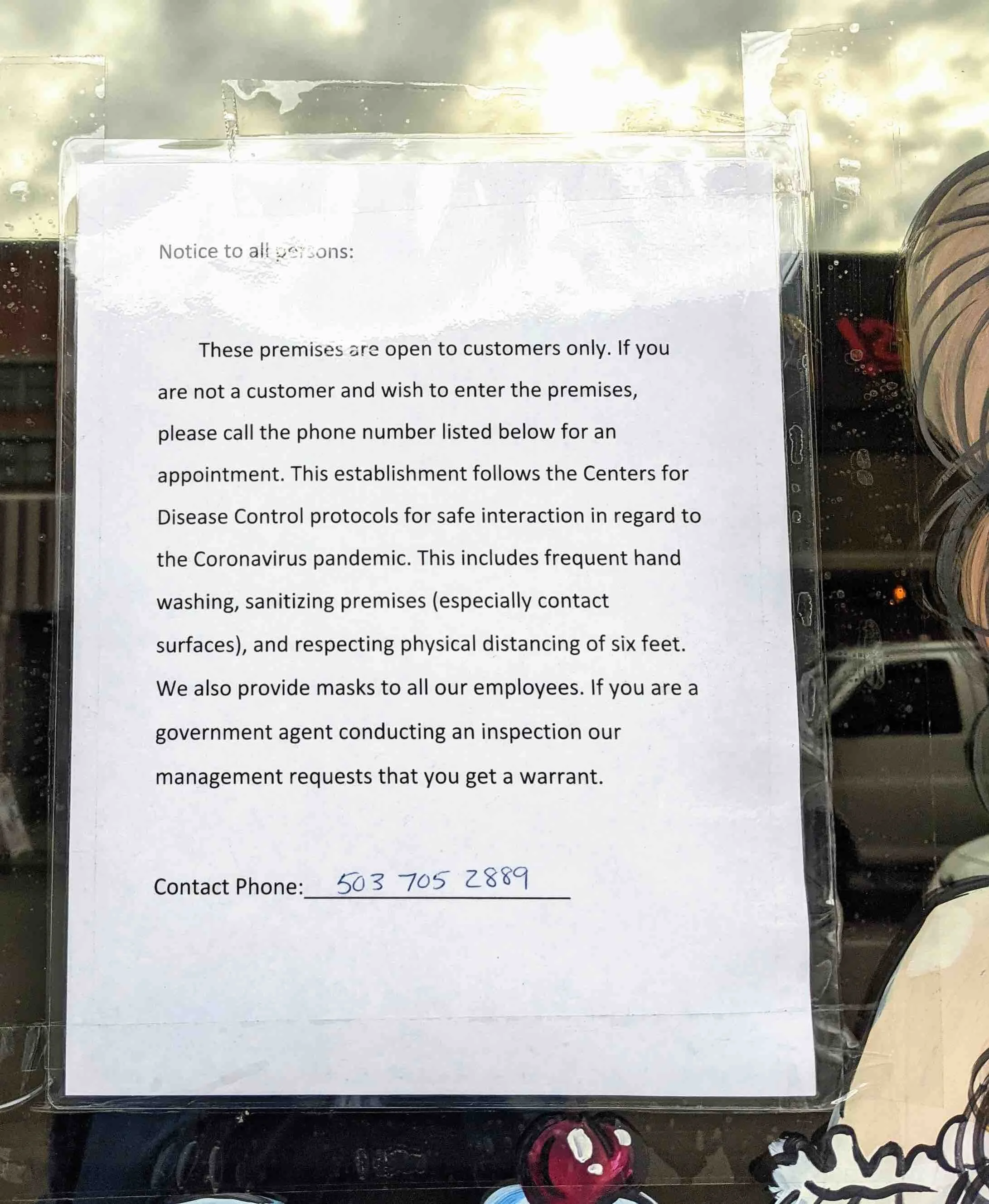 Pictured: Note taped to the front door of The Last Stop Saloon