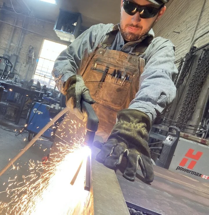 Tyler Luna makes a cut this morning at The Dalles Iron Works, this morning, Friday,  April 2. Luna and his boss Jon Keyser were excited to hear that CGCC is offering an Advanced Manufacturing class this summer as the school pushes into a program tha…