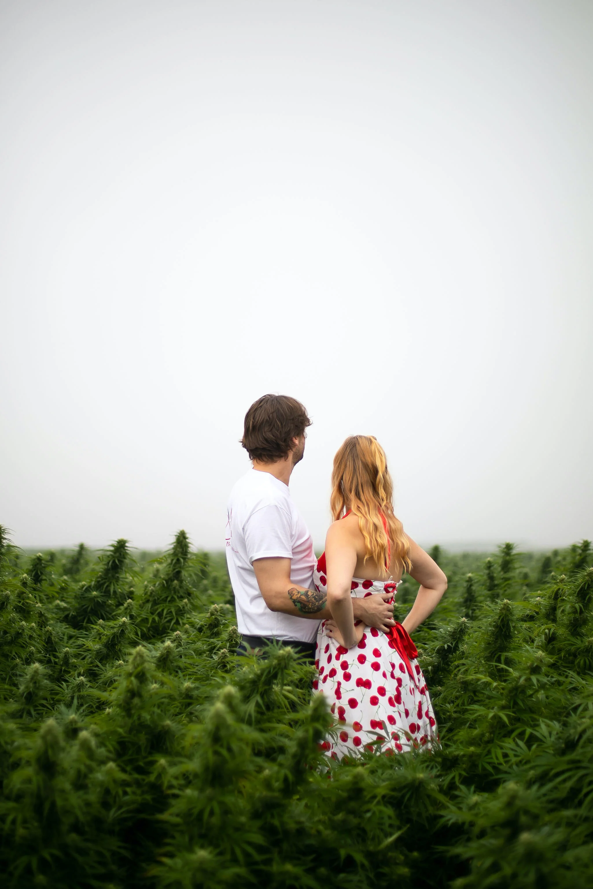Photo of Scott and Allison in the hemp fields. Photo by Brittany Brown with Fresh B Photography