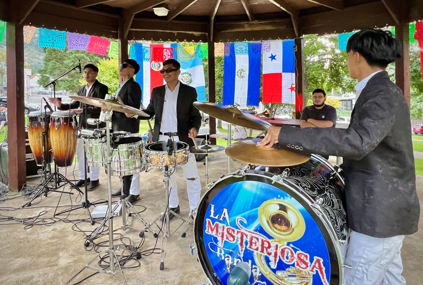 Headliner group La Misteriosa Banda 360 fills the night with music.